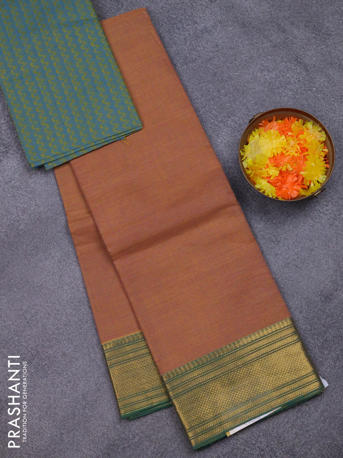 Chettinad cotton saree rust shade and teal green with allover small checked pattern and zari woven border