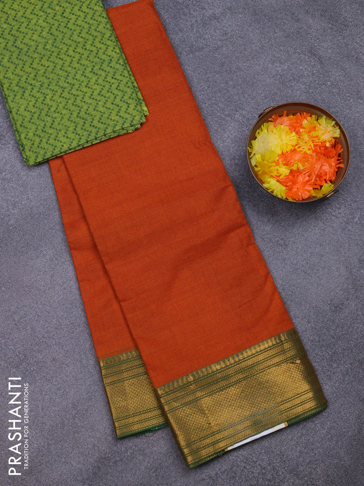 Chettinad cotton saree rustic orange and green with allover small checked pattern and zari woven border