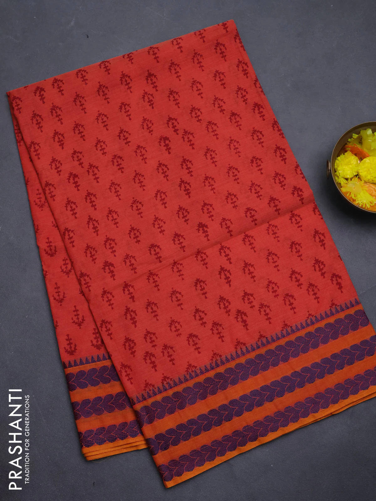 Chettinad cotton saree rustic orange and mustard yellow with allover prints and thread woven border