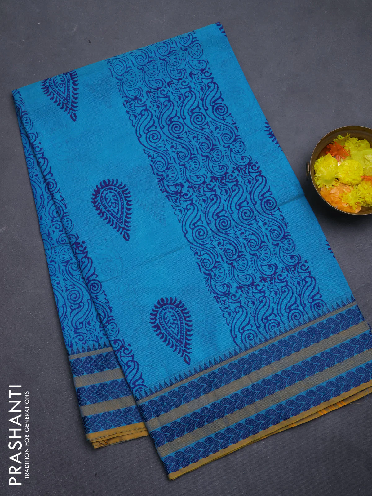 Chettinad cotton saree teal blue and mustard yellow with allover prints and thread woven border