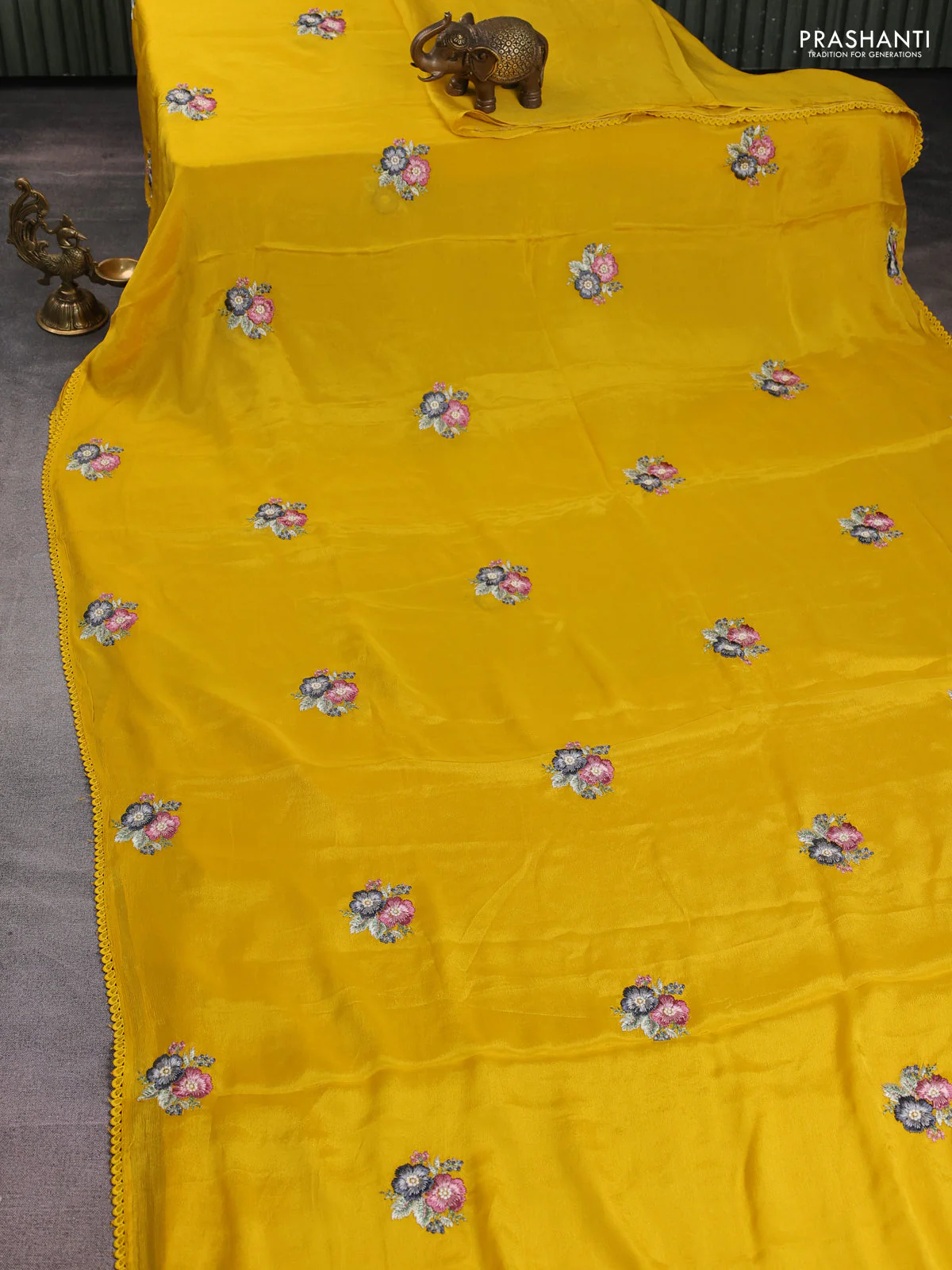 Chiffon silk saree mustard yellow with floral embroidery and lace work border - Image 2