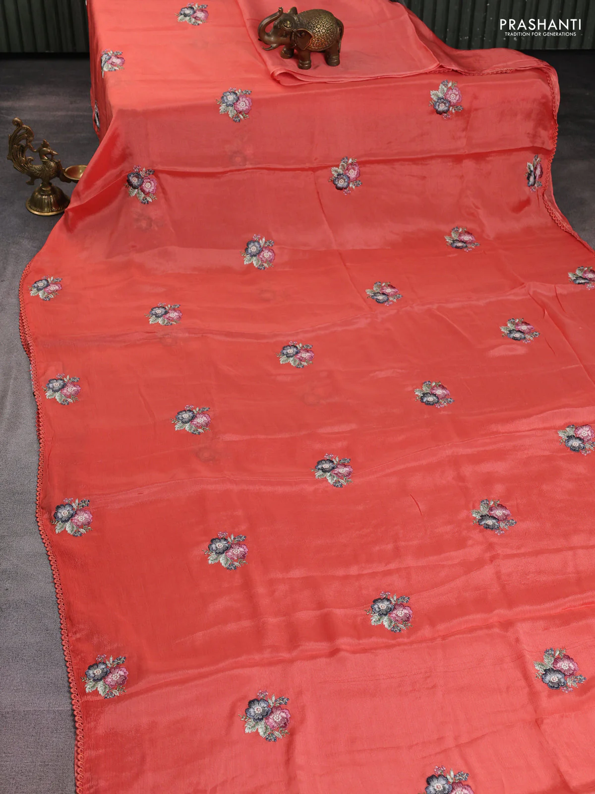 Chiffon silk saree peach shade with floral embroidery and lace work border - Image 2