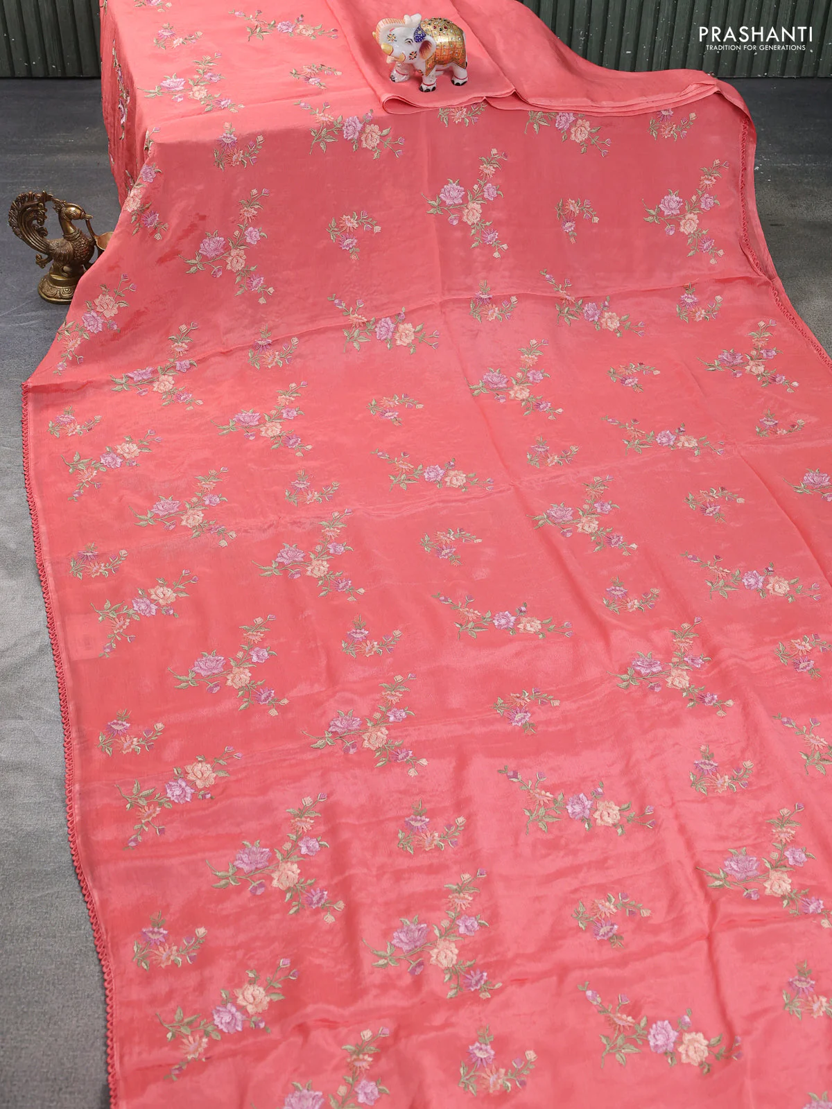 Chiffon silk saree peach shade with floral embroidery and lace work border - Image 2