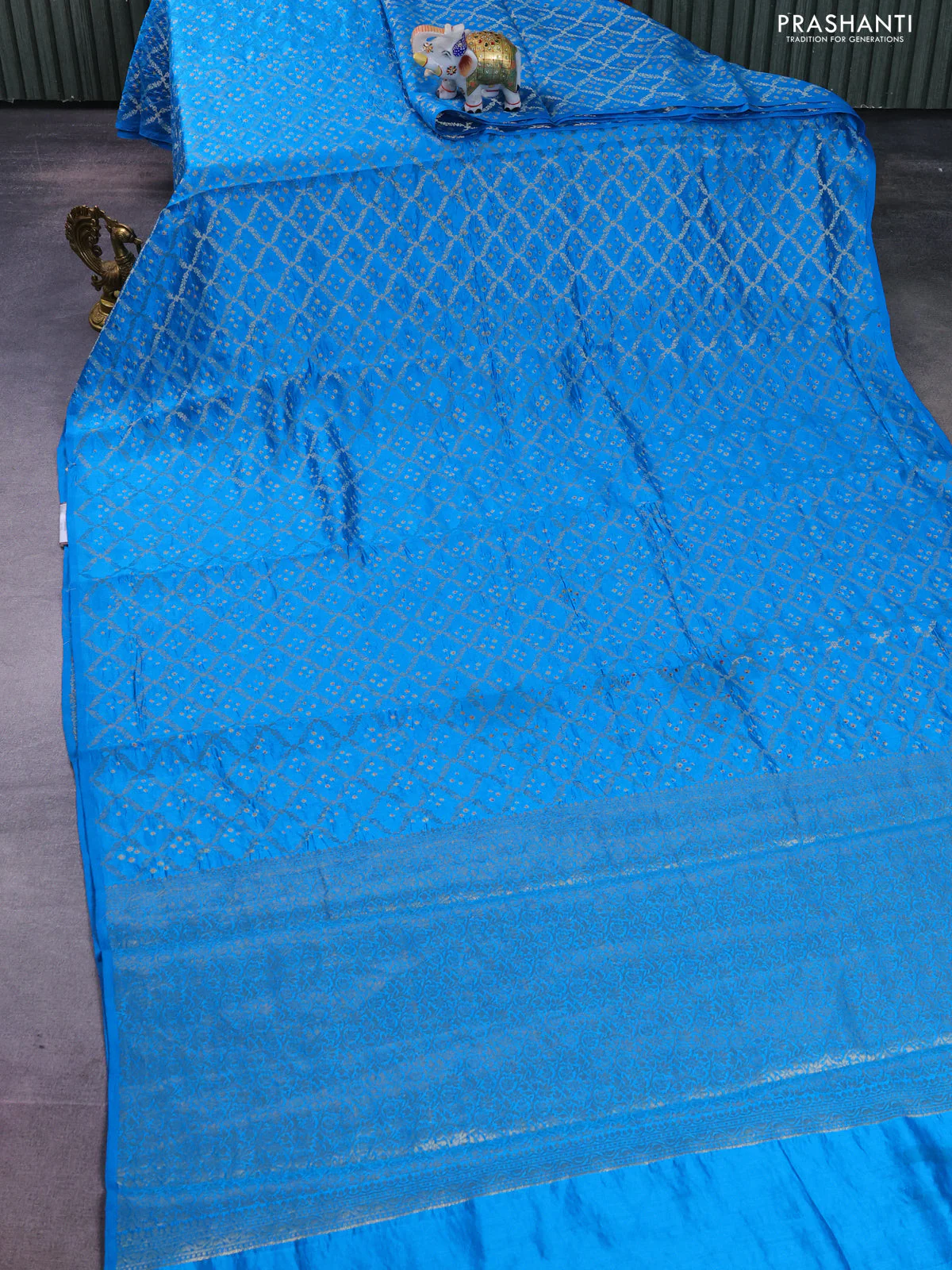 Chiniya silk saree cs blue with allover zari weaves & bandhini prints and zari woven border - Image 2
