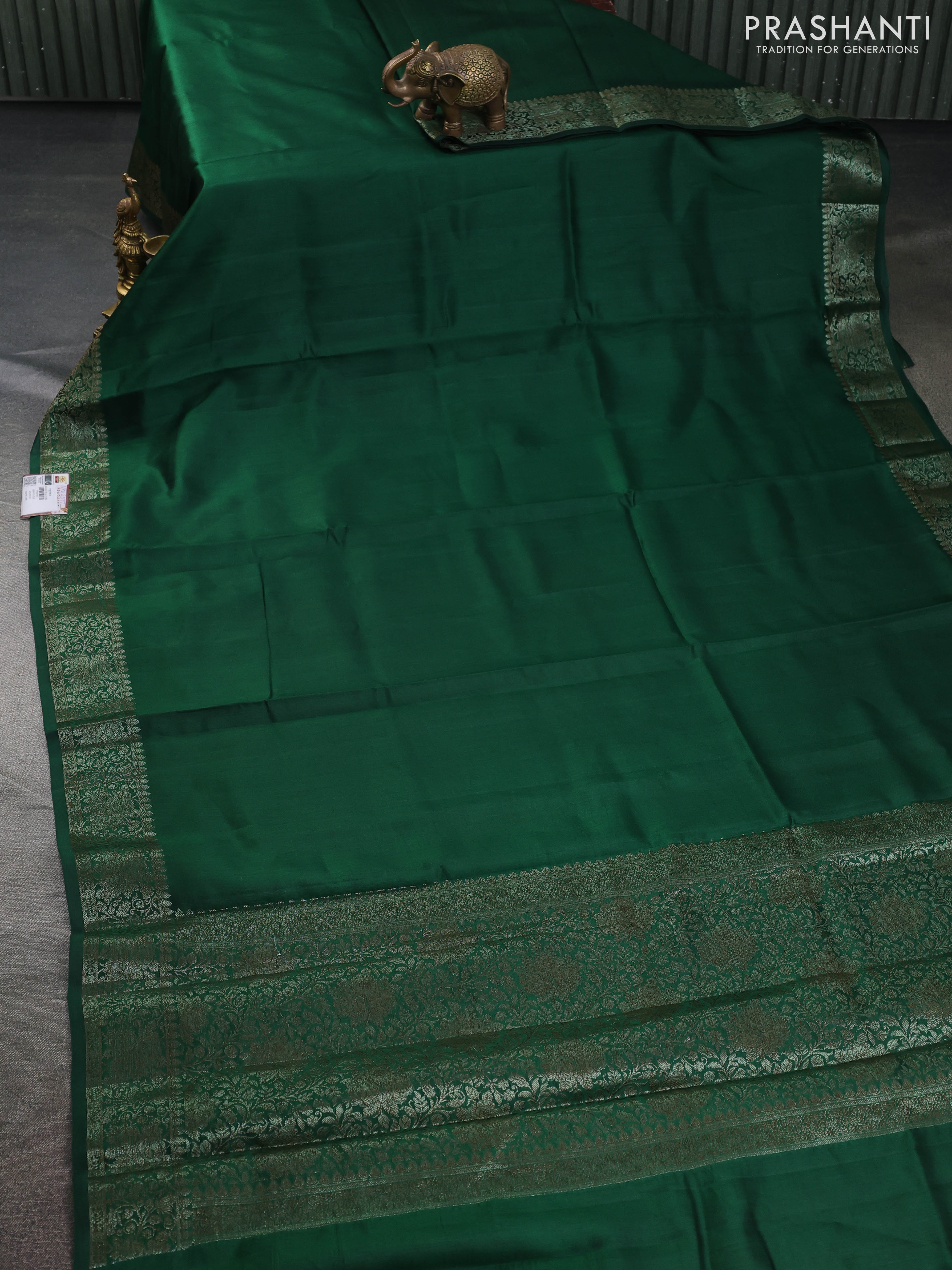 Chiniya silk saree dark green and rust shade with plain body and woven border - Image 2