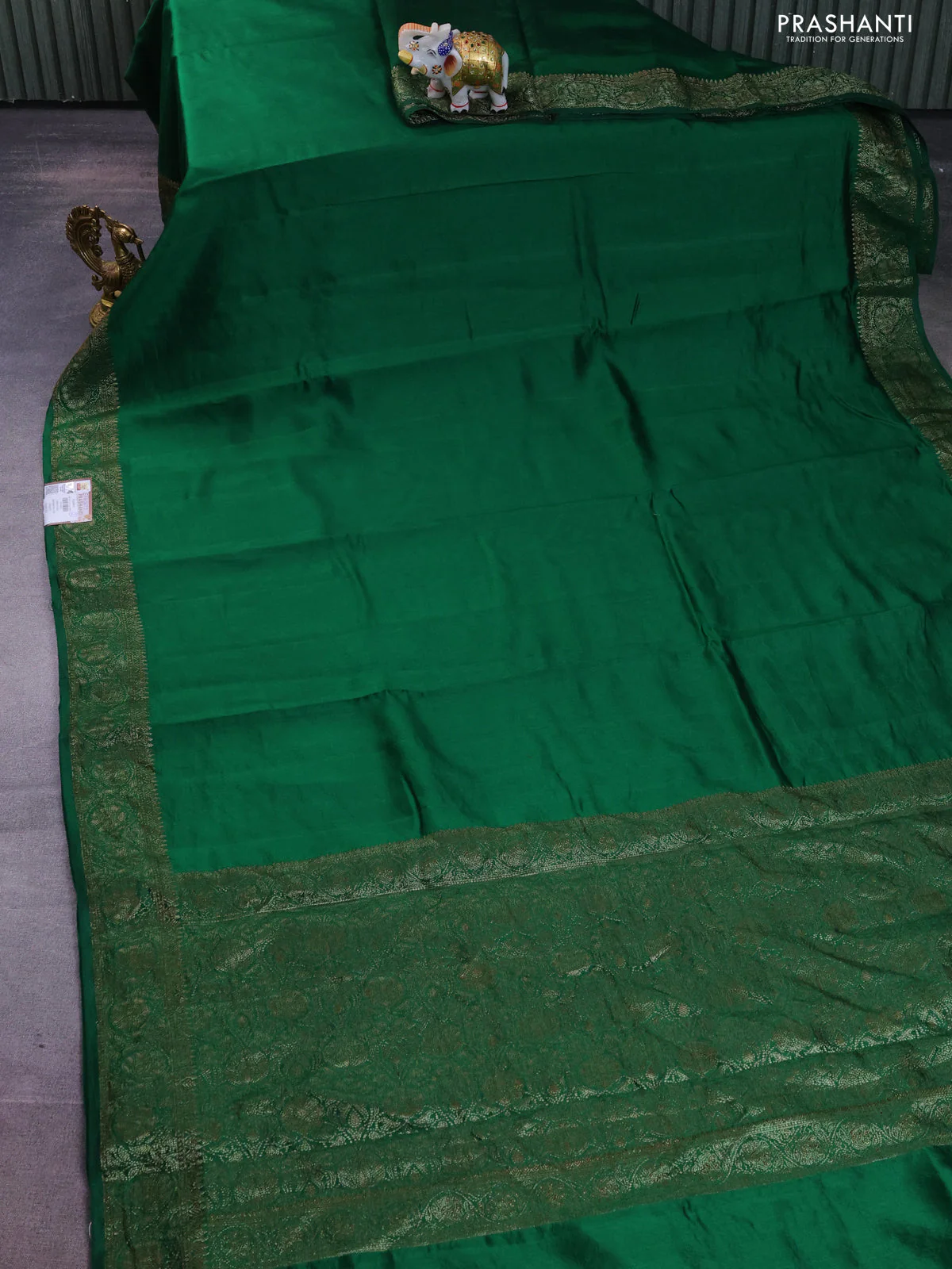 Chiniya silk saree green with plain body and woven border - Image 2