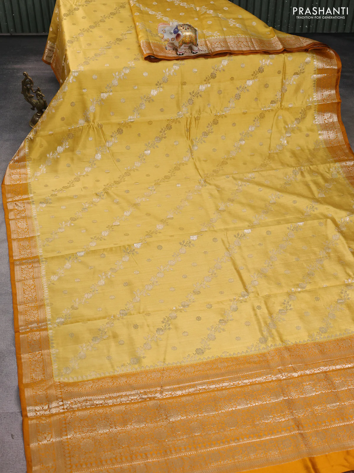 Chiniya silk saree mustard shade and dark mustard with allover zari weaves and zari woven border - Image 2