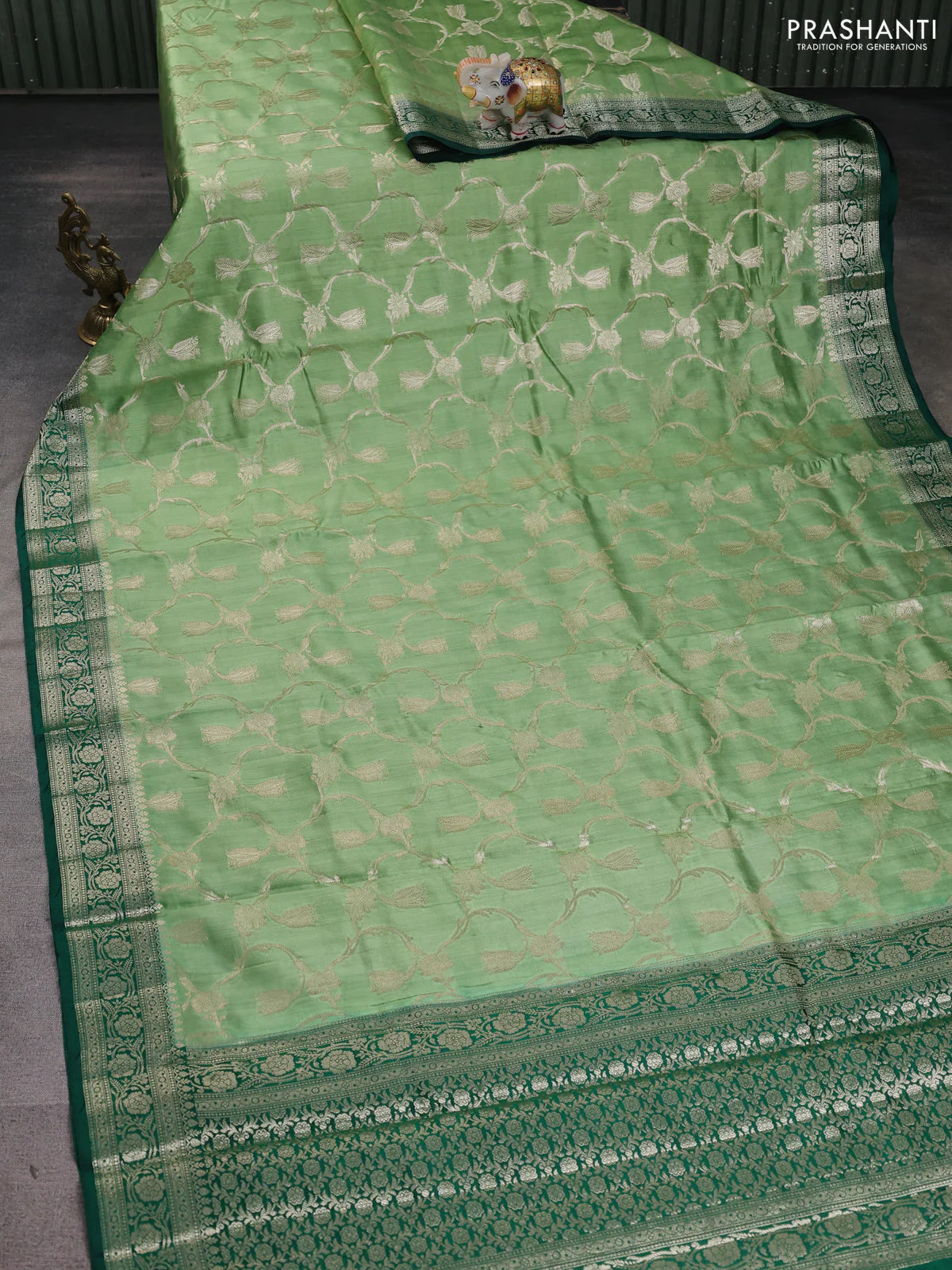 Chiniya silk saree pastel green and dark green with allover floral zari weaves and zari woven border - Image 2