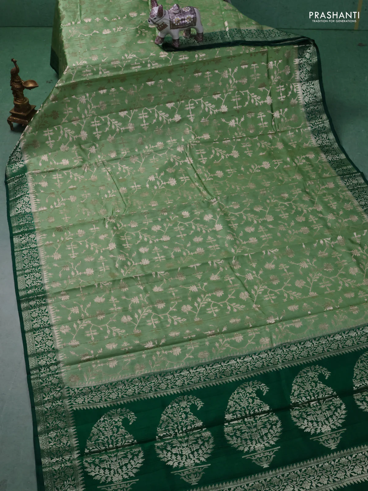 Chiniya silk saree pastel green and dark green with allover zari weaves and zari woven border - Image 2