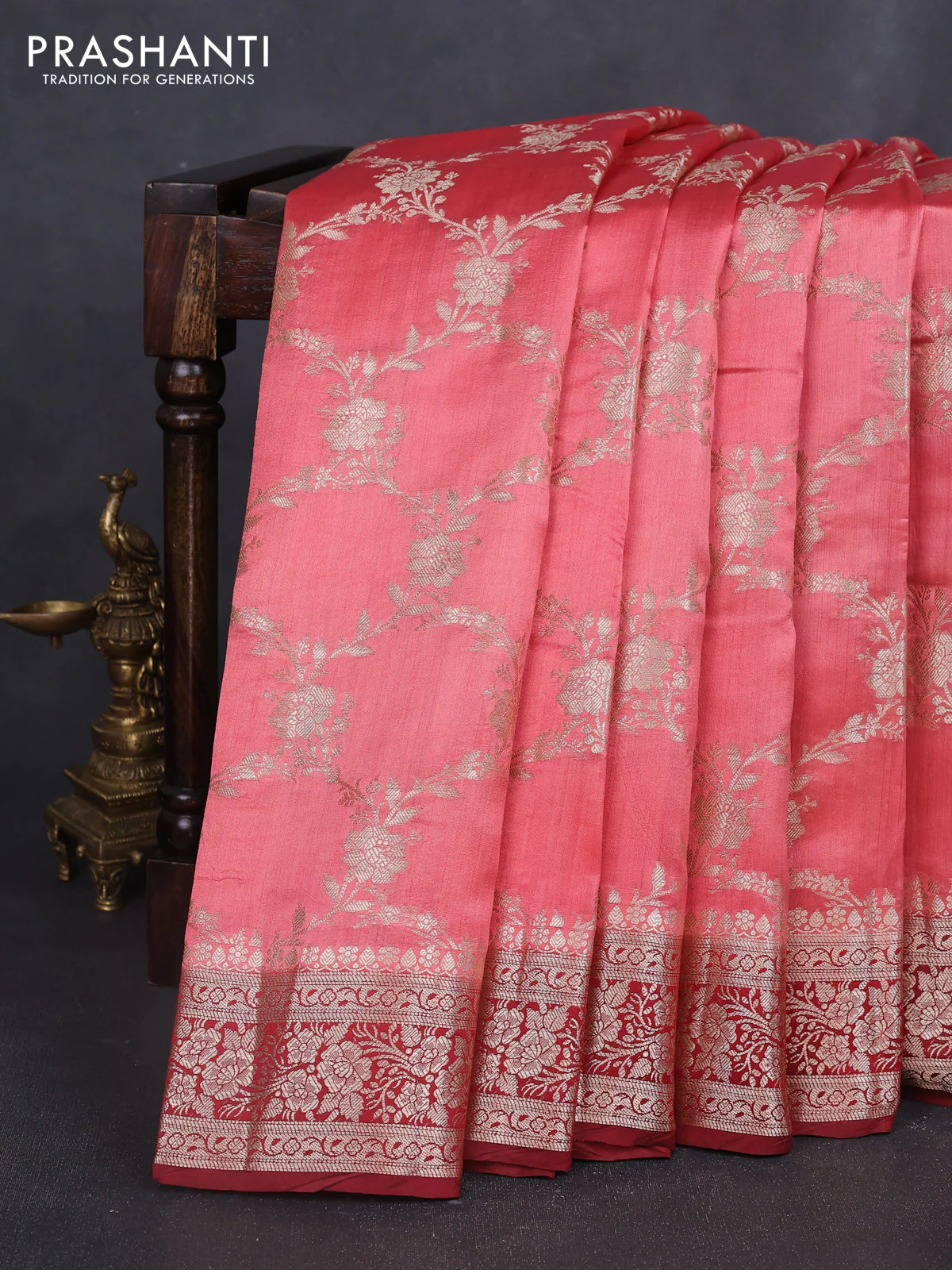 Chiniya silk saree peach shade and maroon with allover floral zari weaves and zari woven border