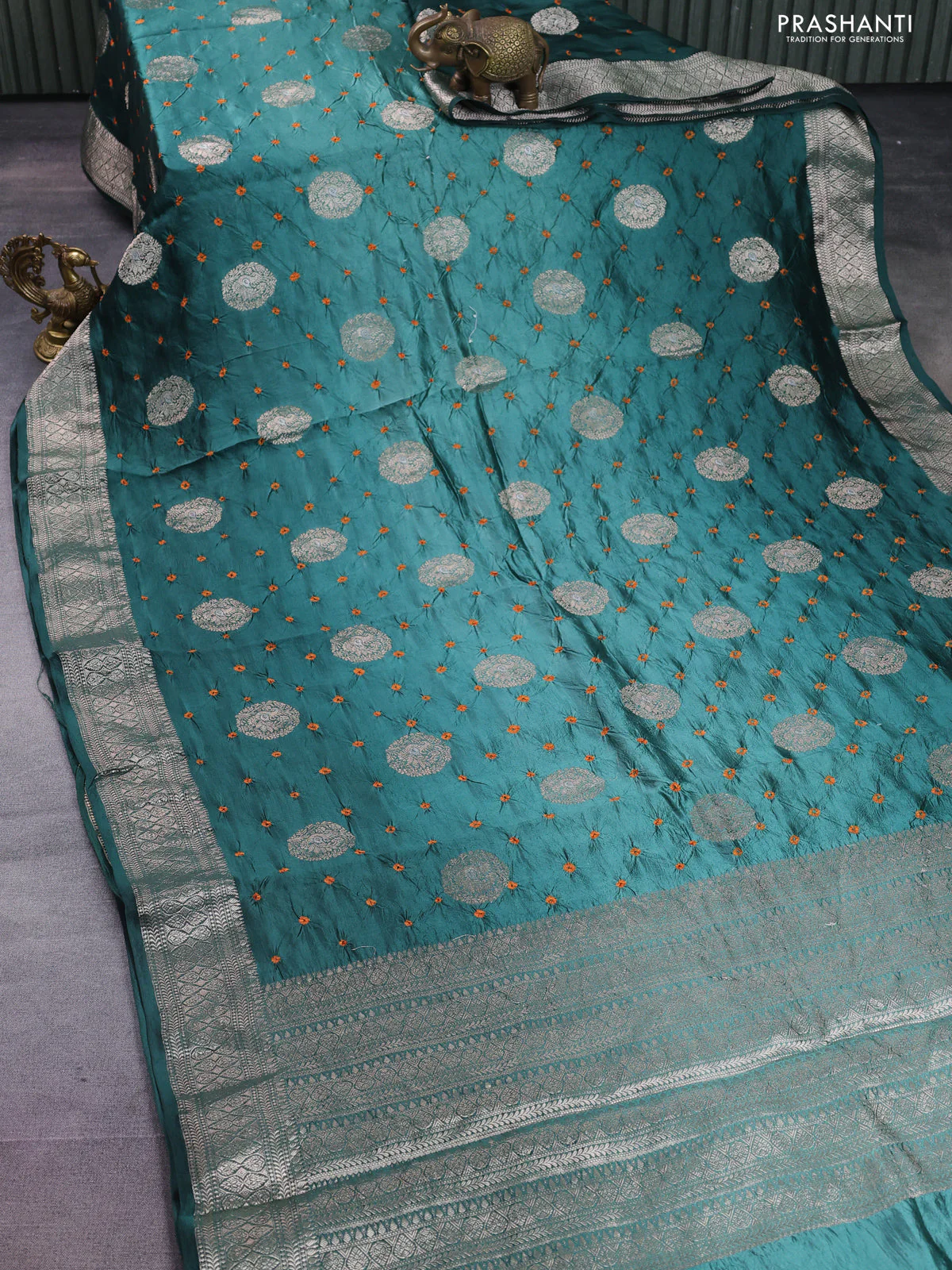 Chiniya silk saree peacock green with allover zari buttas & bandhini prints and zari woven border - Image 2