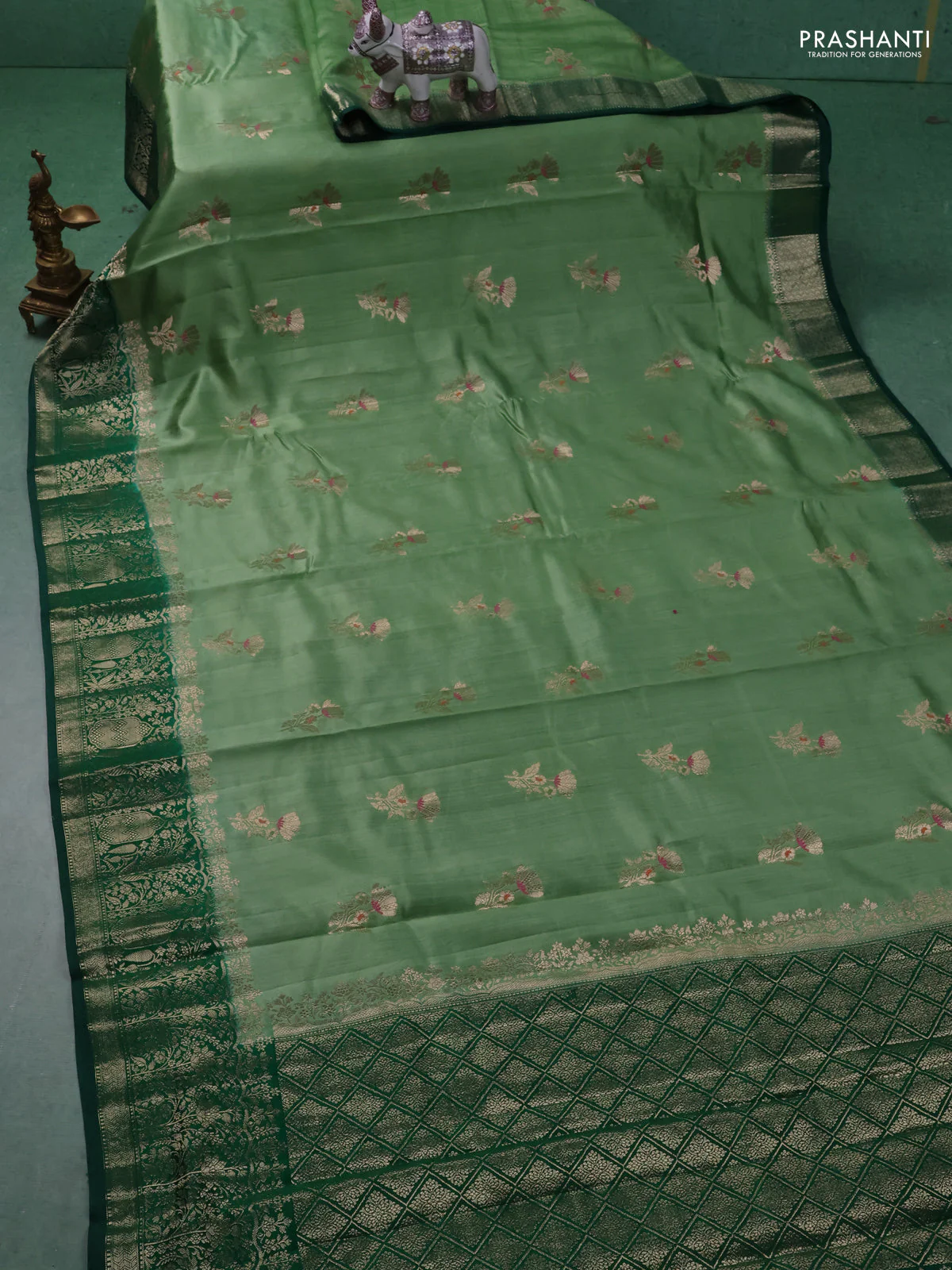 Chiniya silk saree pista green and dark green with floral zari woven buttas and zari woven border - Image 2