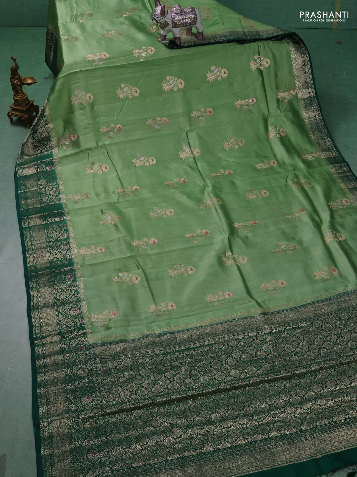 Chiniya silk saree pista green and dark green with floral zari woven buttas and zari woven border - Image 2