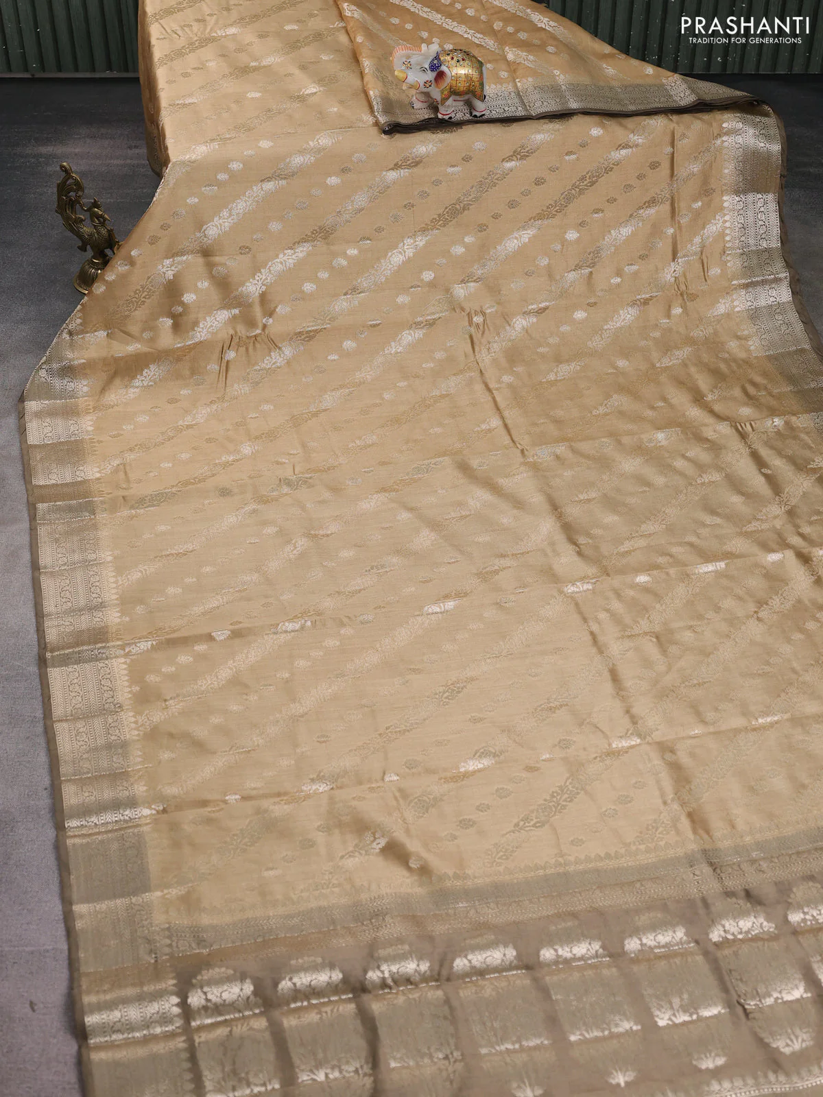 Chiniya silk saree sandal and pastel brown shade with allover zari weaves and zari woven border - Image 2