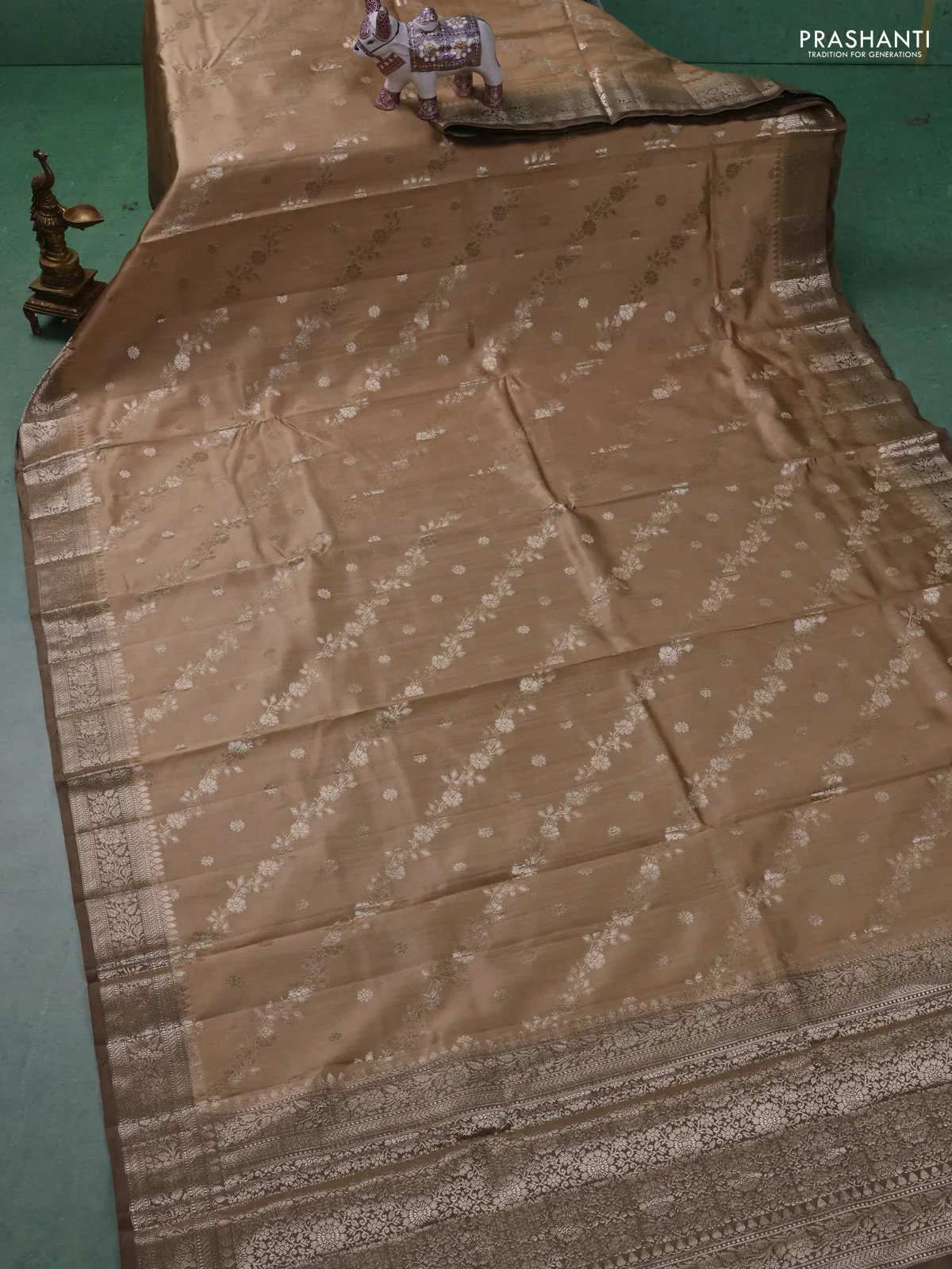 Chiniya silk saree sandal and pastel brown with allover zari weaves and zari woven border - Image 2