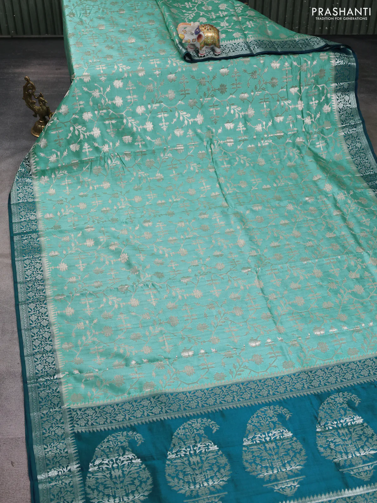 Chiniya silk saree teal blue shade and peacock blue with allover zari weaves and zari woven border - Image 2