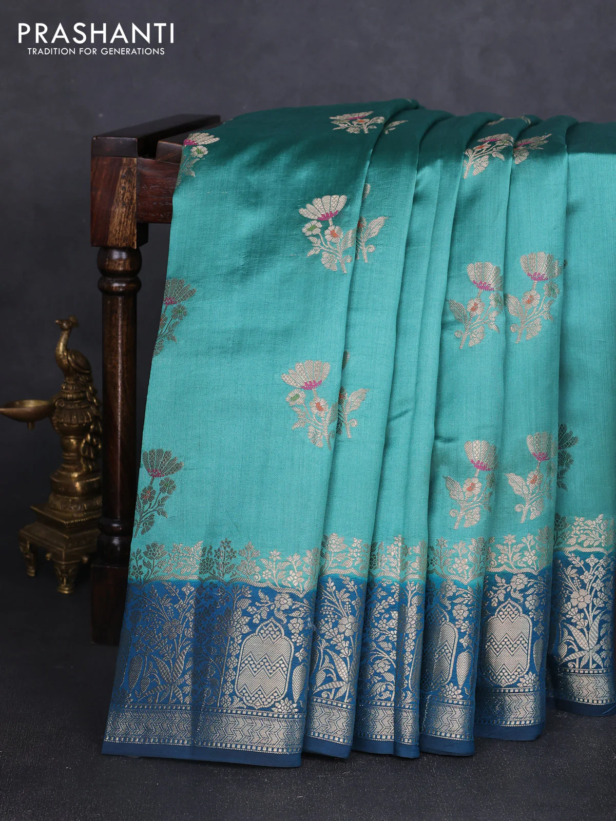 Chiniya silk saree teal green shade and peacock blue with floral zari woven buttas and zari woven border