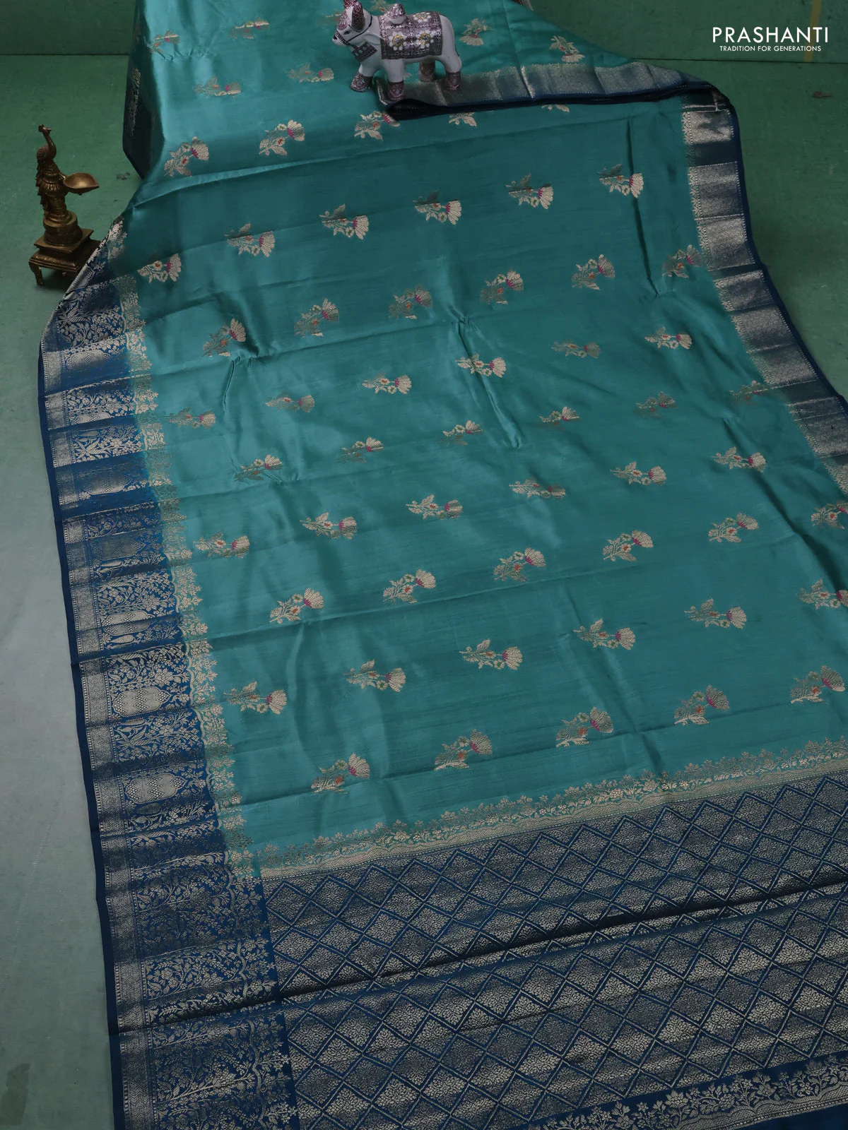 Chiniya silk saree teal green shade and peacock blue with floral zari woven buttas and zari woven border - Image 2