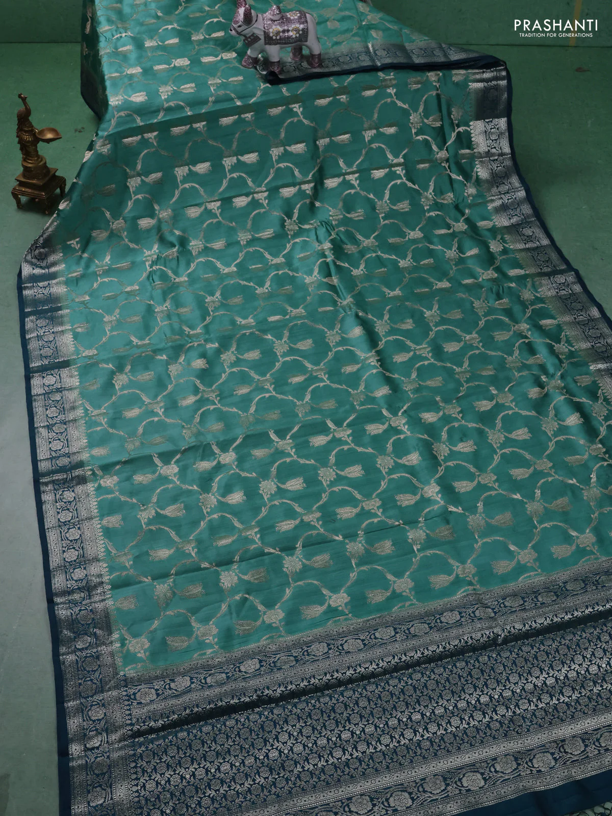 Chiniya silk saree teal shade and peacock blue with allover floral zari weaves and zari woven border - Image 2