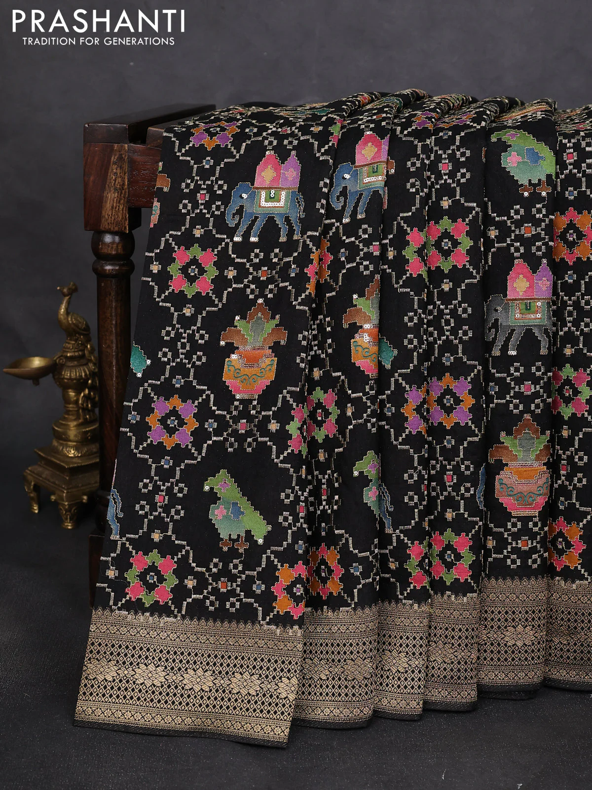 Crepe silk saree black with allover patola mina weaves & sequin work and zari woven border - Image 2