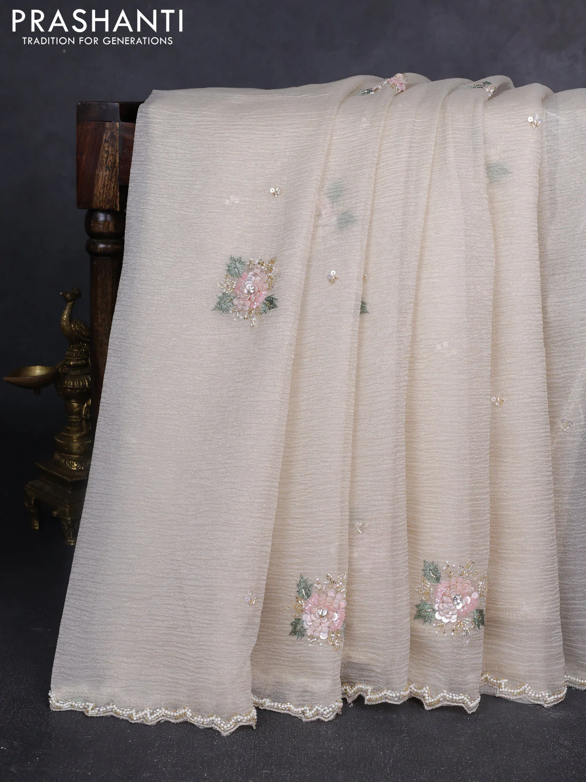 Crush tissue saree cream with allover floral embroidery sequin work