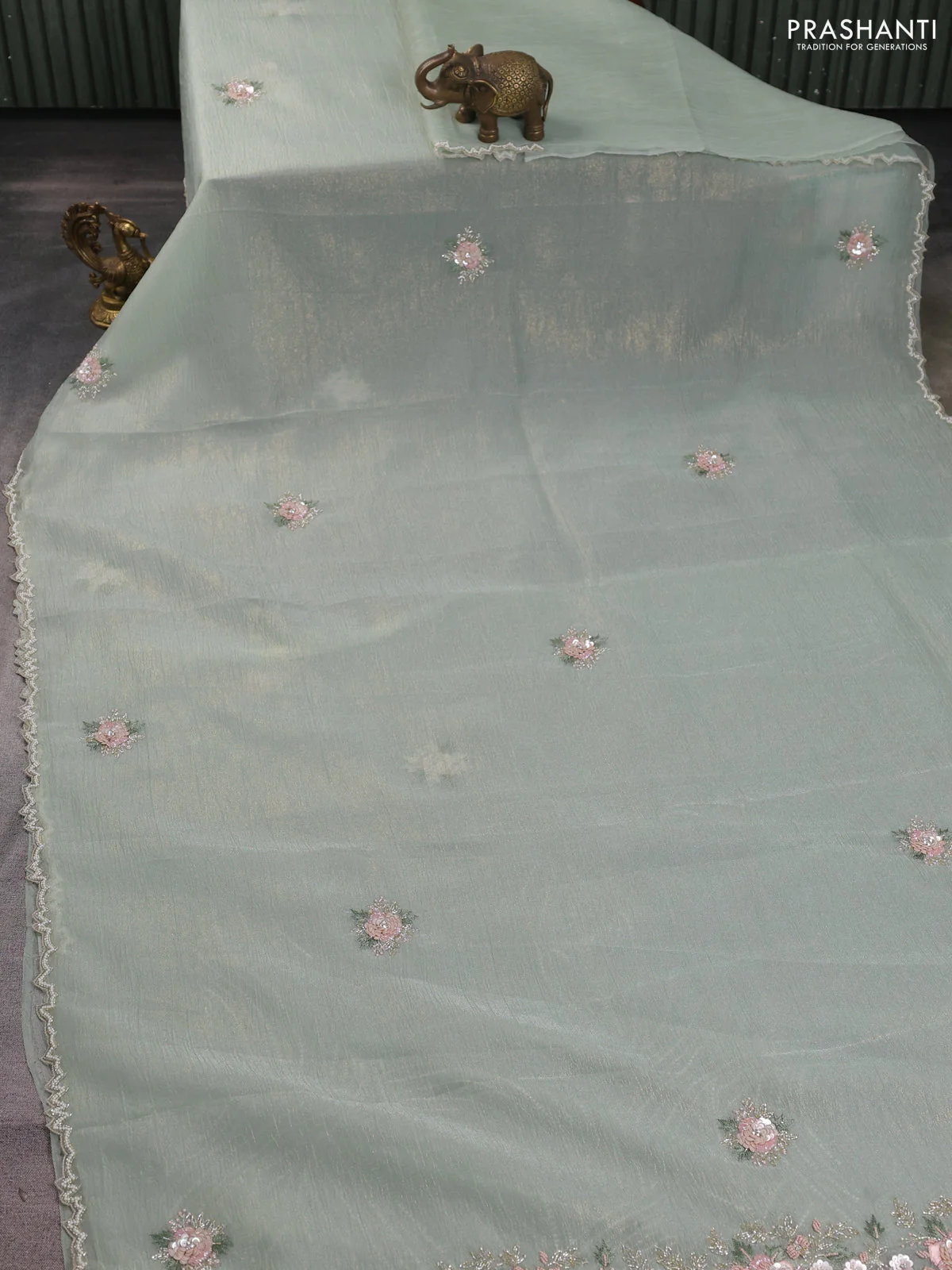 Crush tissue saree pastel green with allover floral embroidery sequin work - Image 2