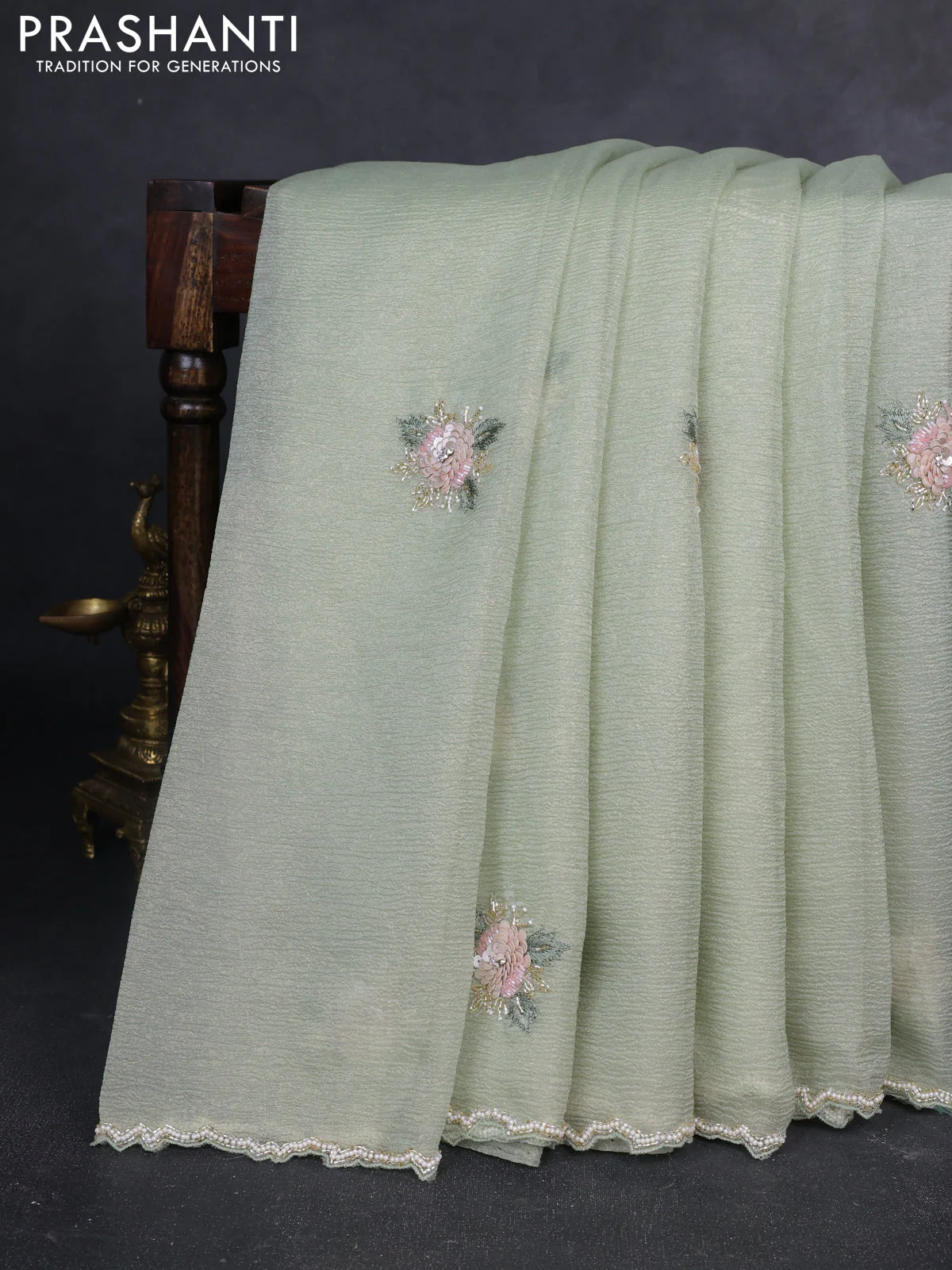 Crush tissue saree pastel green with allover floral embroidery sequin work