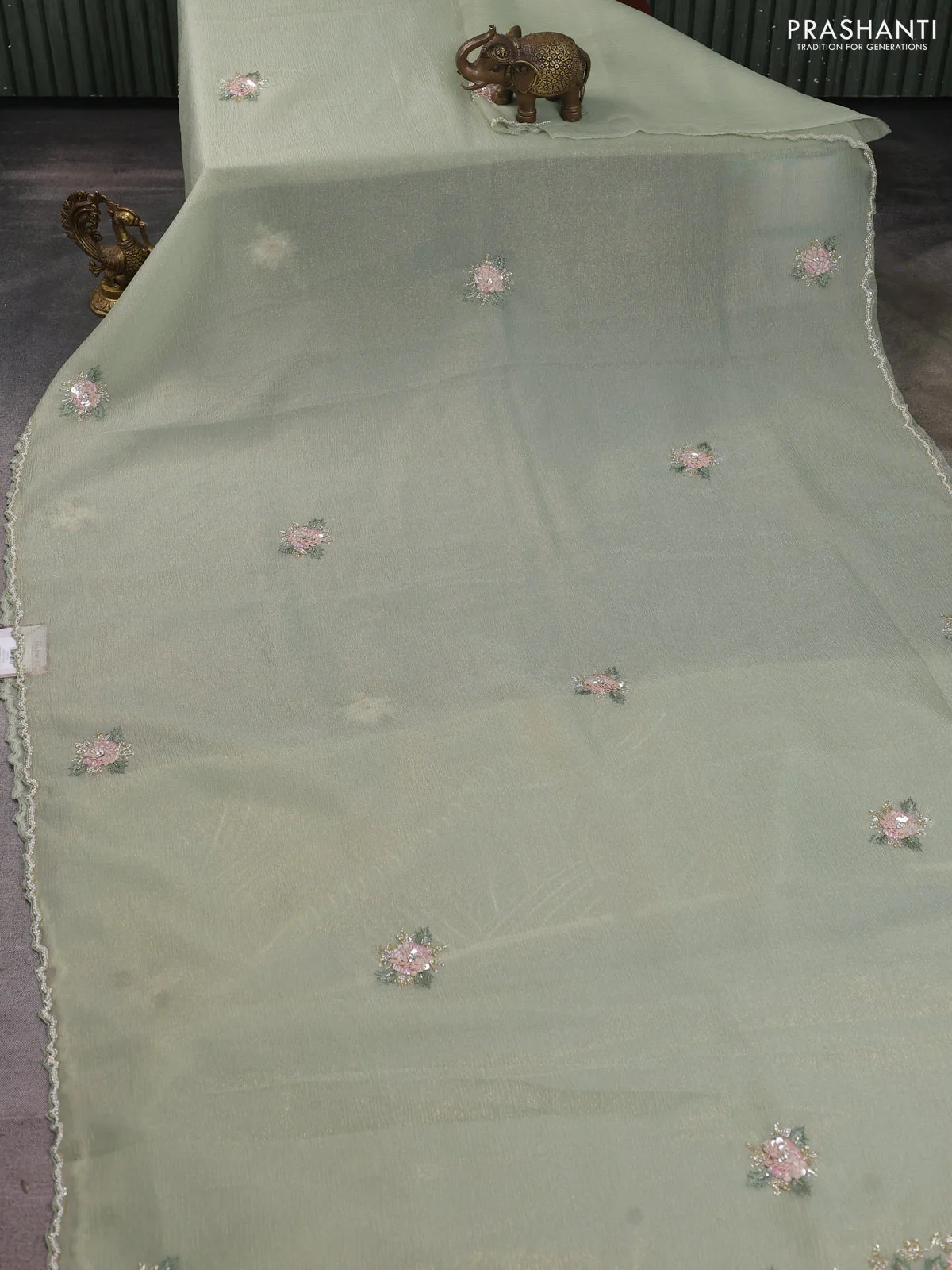 Crush tissue saree pastel green with allover floral embroidery sequin work - Image 2