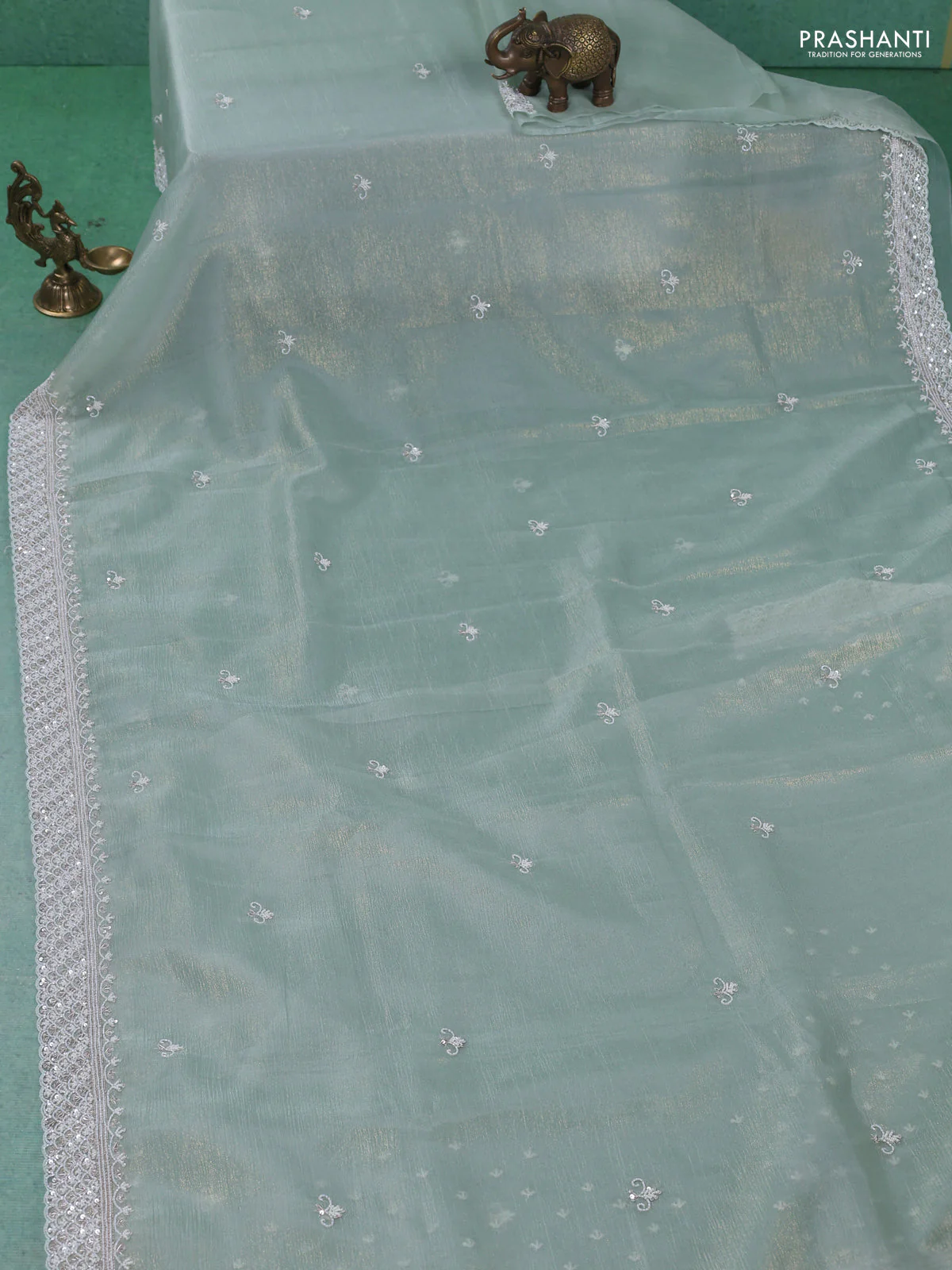 Crush tissue saree pastel green with beaded work and sequin & cut beaded work border - Image 2