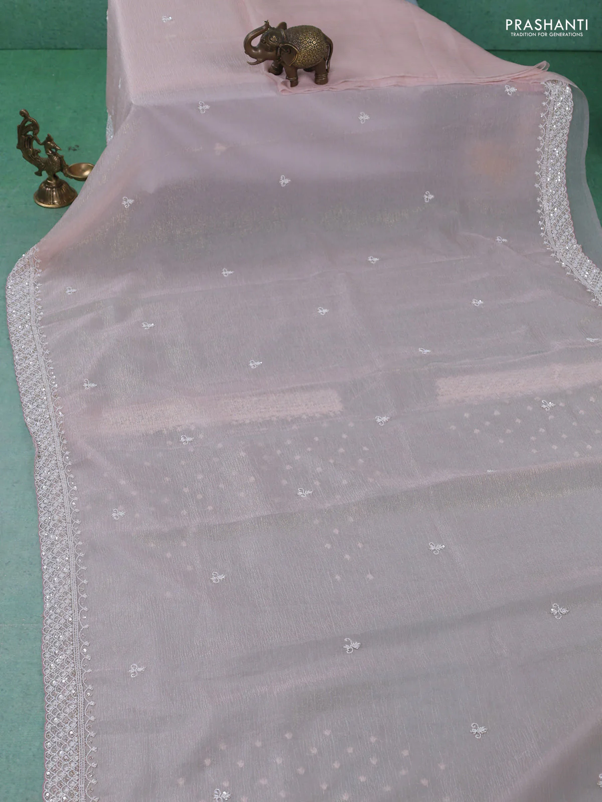 Crush tissue saree pastel peach with beaded work and sequin & cut beaded work border - Image 2