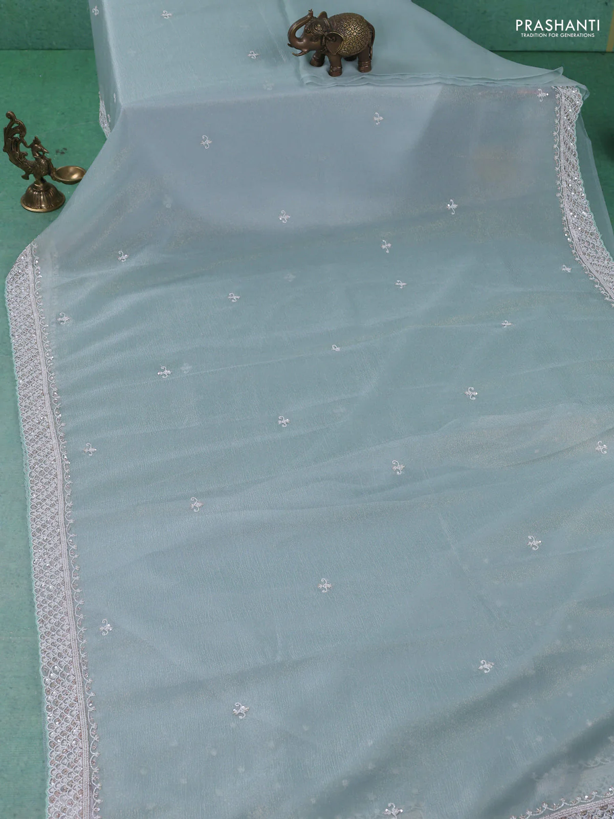 Crush tissue saree teal shade with beaded work and sequin & cut beaded work border - Image 2