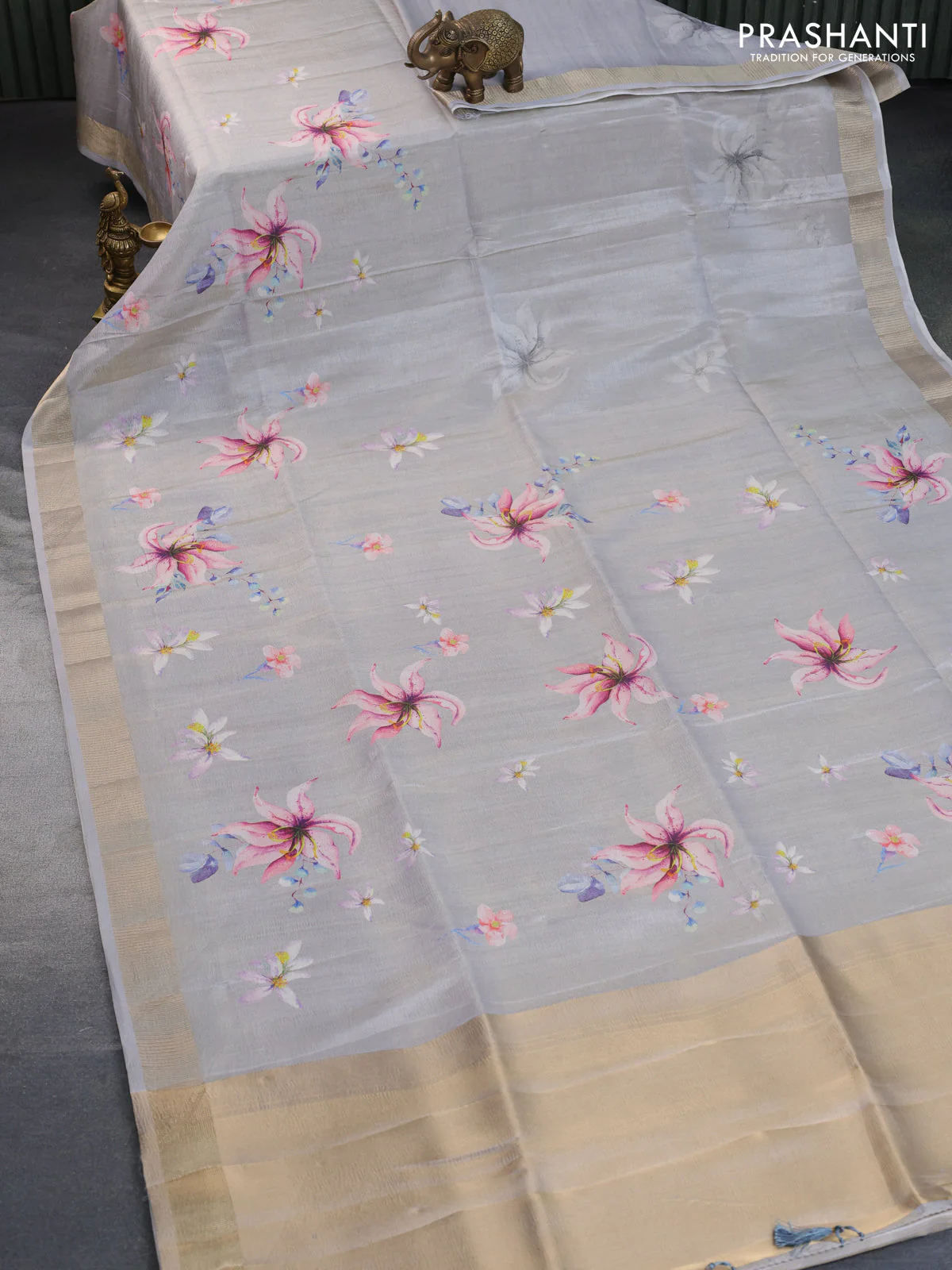 Crushed tissue saree pastel grey with allover floral digital prints and zari woven border - Image 2