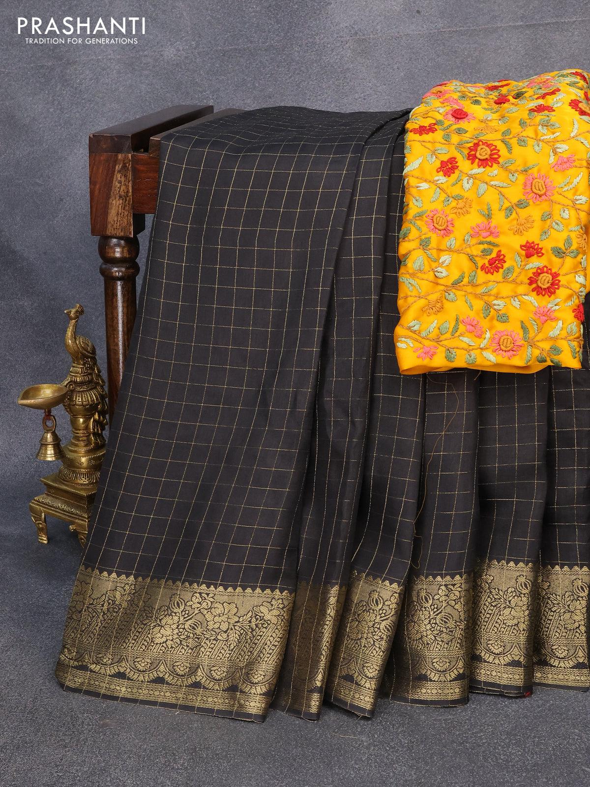 Dola silk saree black and yellow with zari checked pattern and zari woven border with embroidery work blouse