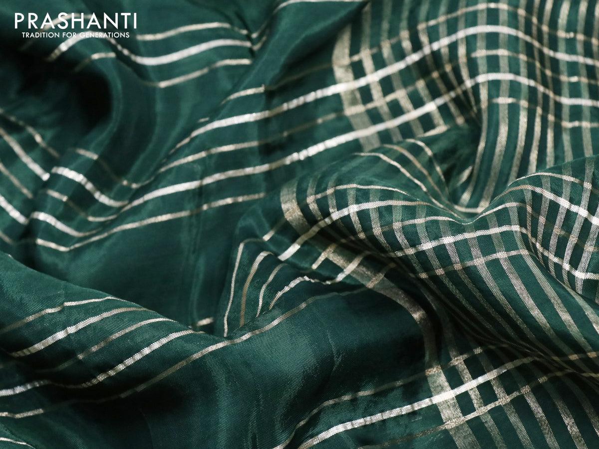 Dola silk saree green and deep wine shade with allover zari woven stripes pattern and rich zari woven border - Image 3