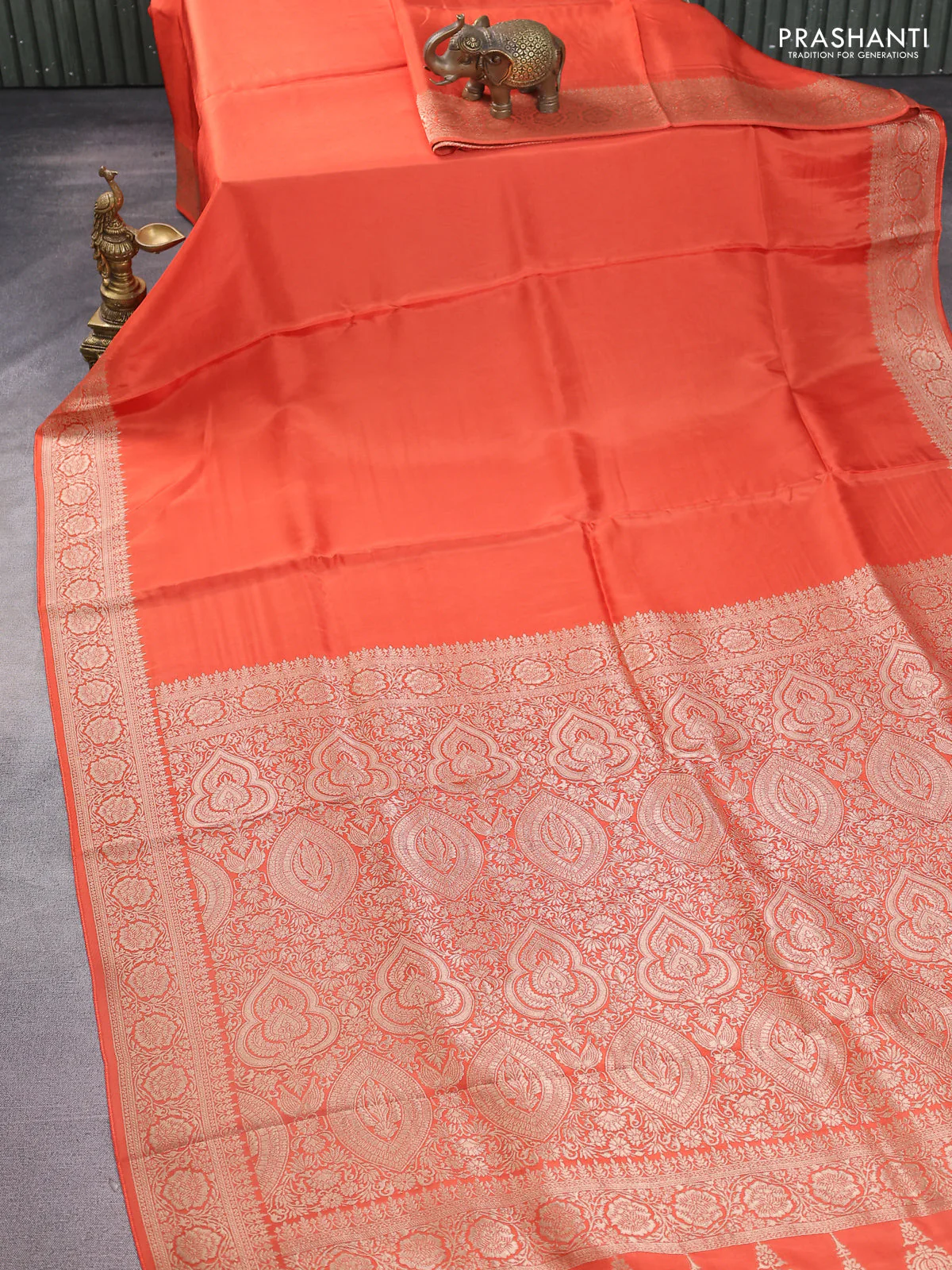 Dola silk saree orange with plain body and zari woven border - Image 2