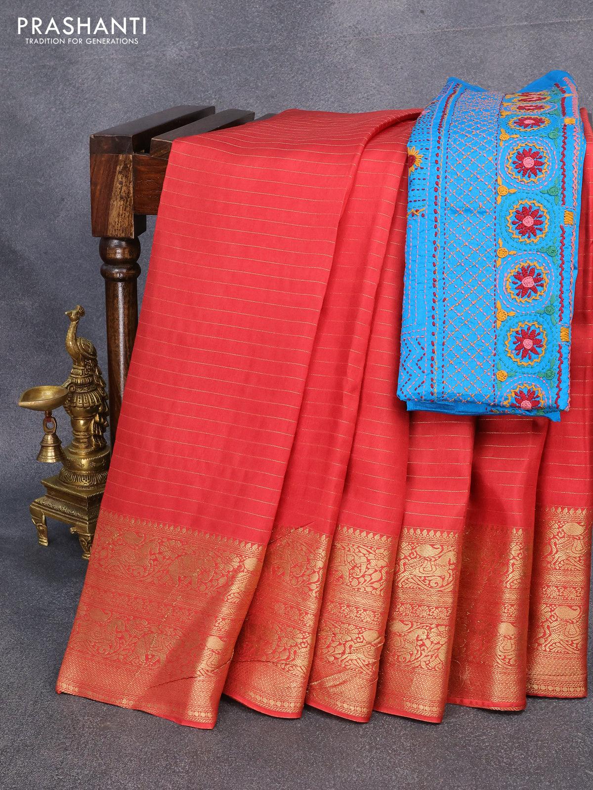 Dola silk saree red shade and cs blue with allover zari woven stripes pattern and zari woven border with embroidery work blouse