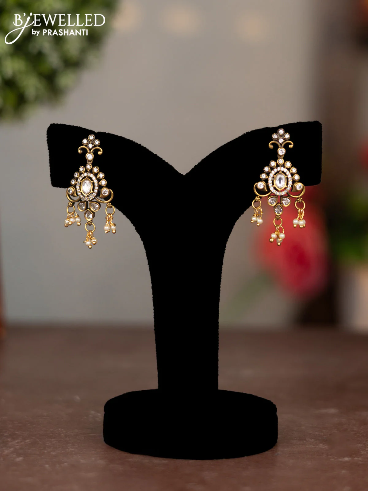 Earring with cz stone and pearl hangings in victorian finish
