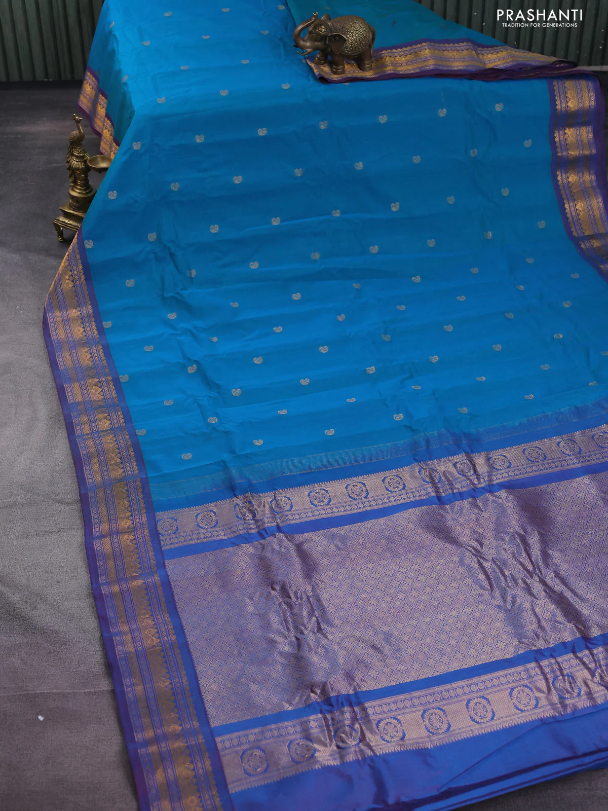 Gadwal silk cotton saree dual shade of bluish green and dual shade of maroon with zari woven buttas and zari woven border - Image 2