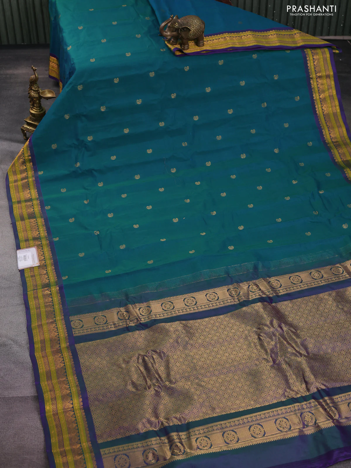 Gadwal silk cotton saree dual shade of greenish blue and dual shade of violet with zari woven paisley buttas and zari woven border - Image 2