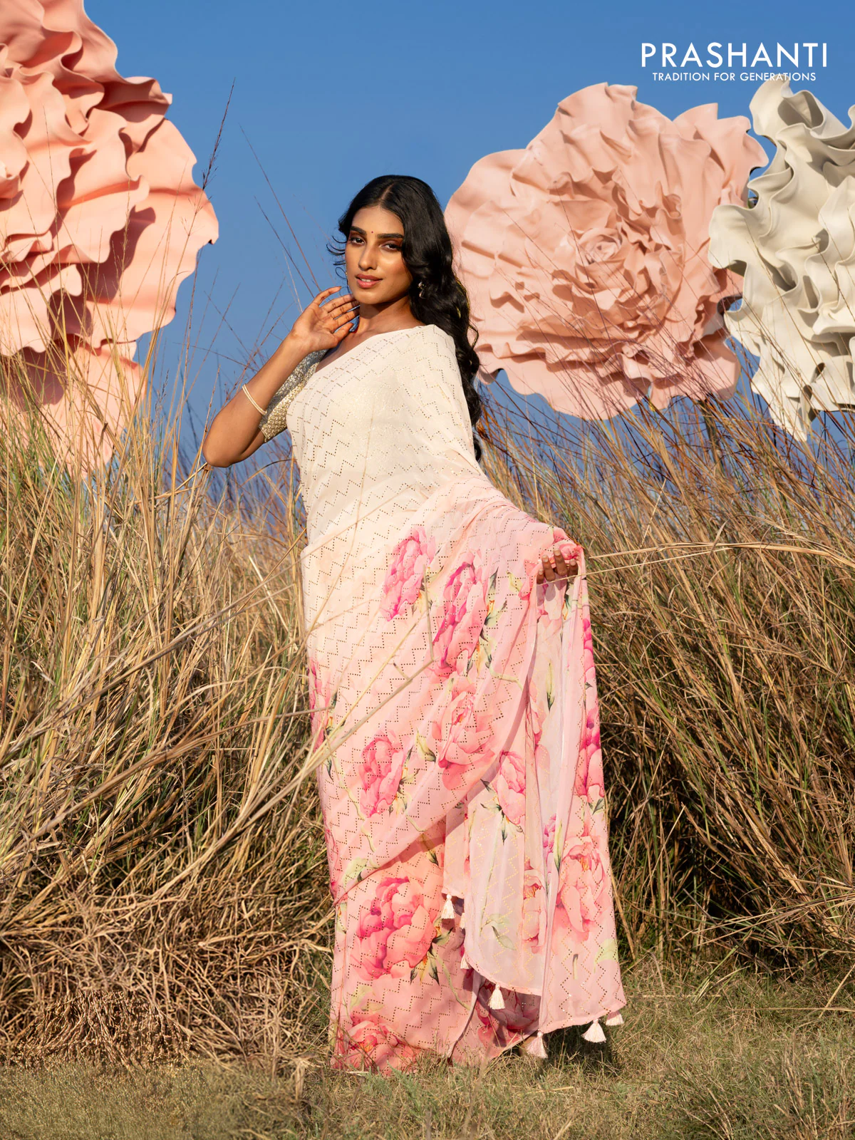 Georgette saree pale orange and mild peach pink with allover floral digital prints & gold stone work