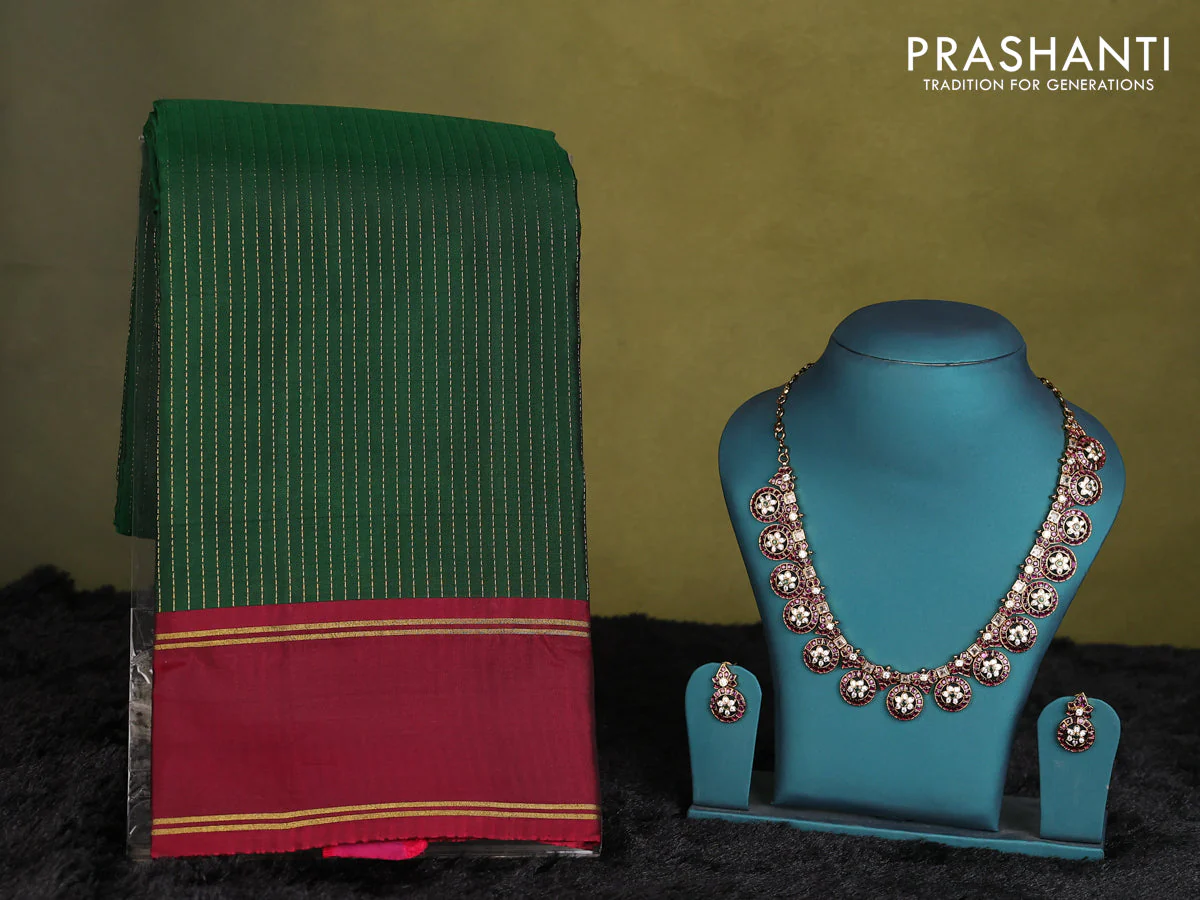 Green-Maroon kanchipuram silk saree with matching antique necklace