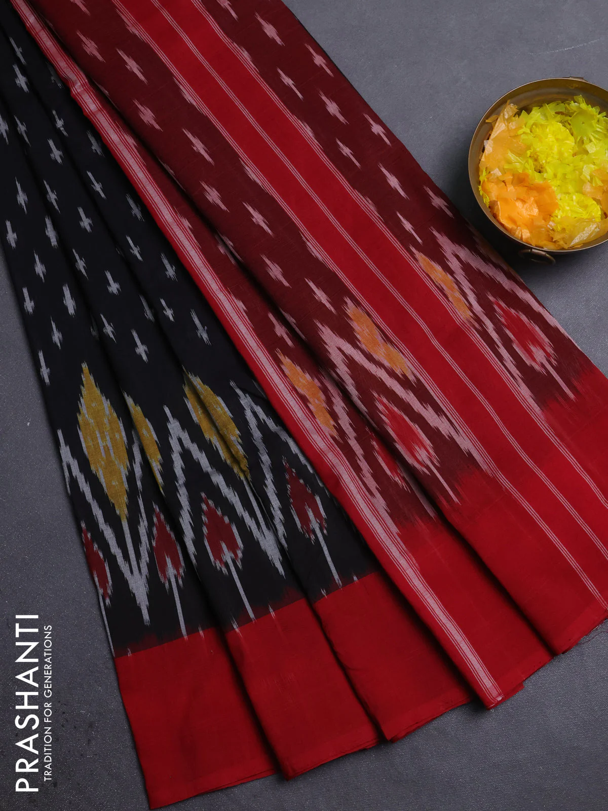 Ikat cotton saree black and maroon with allover ikat weaves and simple border
