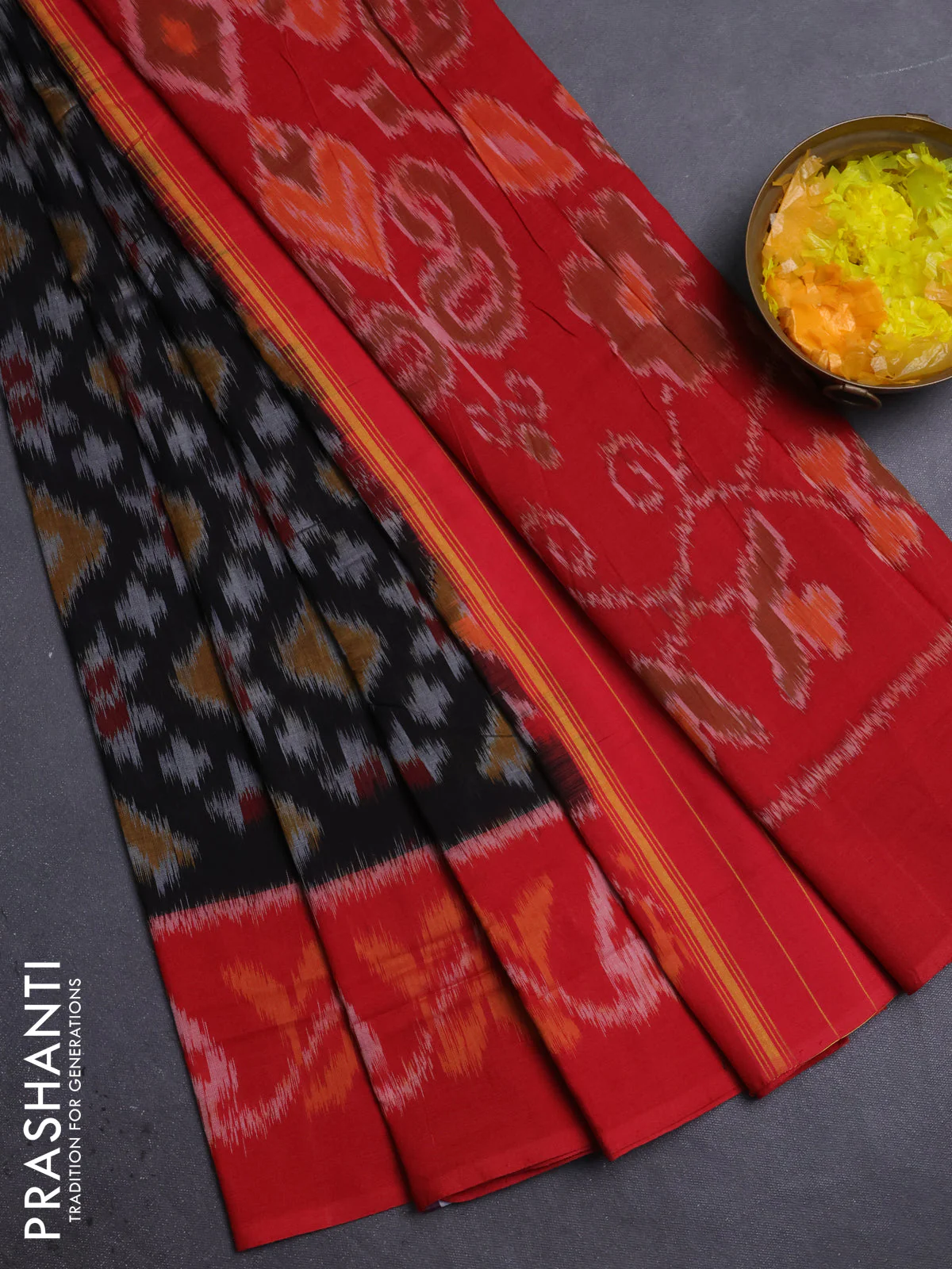 Ikat cotton saree black and red with allover ikat weaves and ikat border
