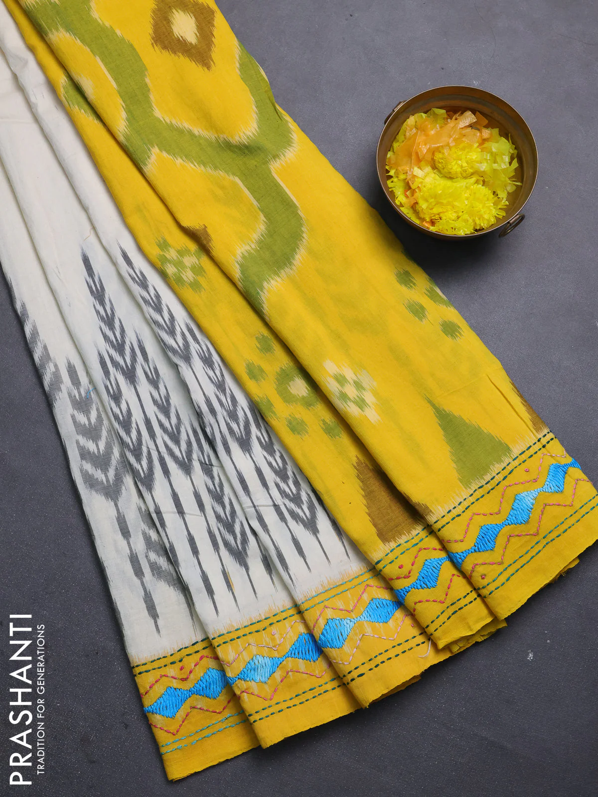 Ikat cotton saree cream black and yellow with allover ikat weaves and kantha stitch work pallu