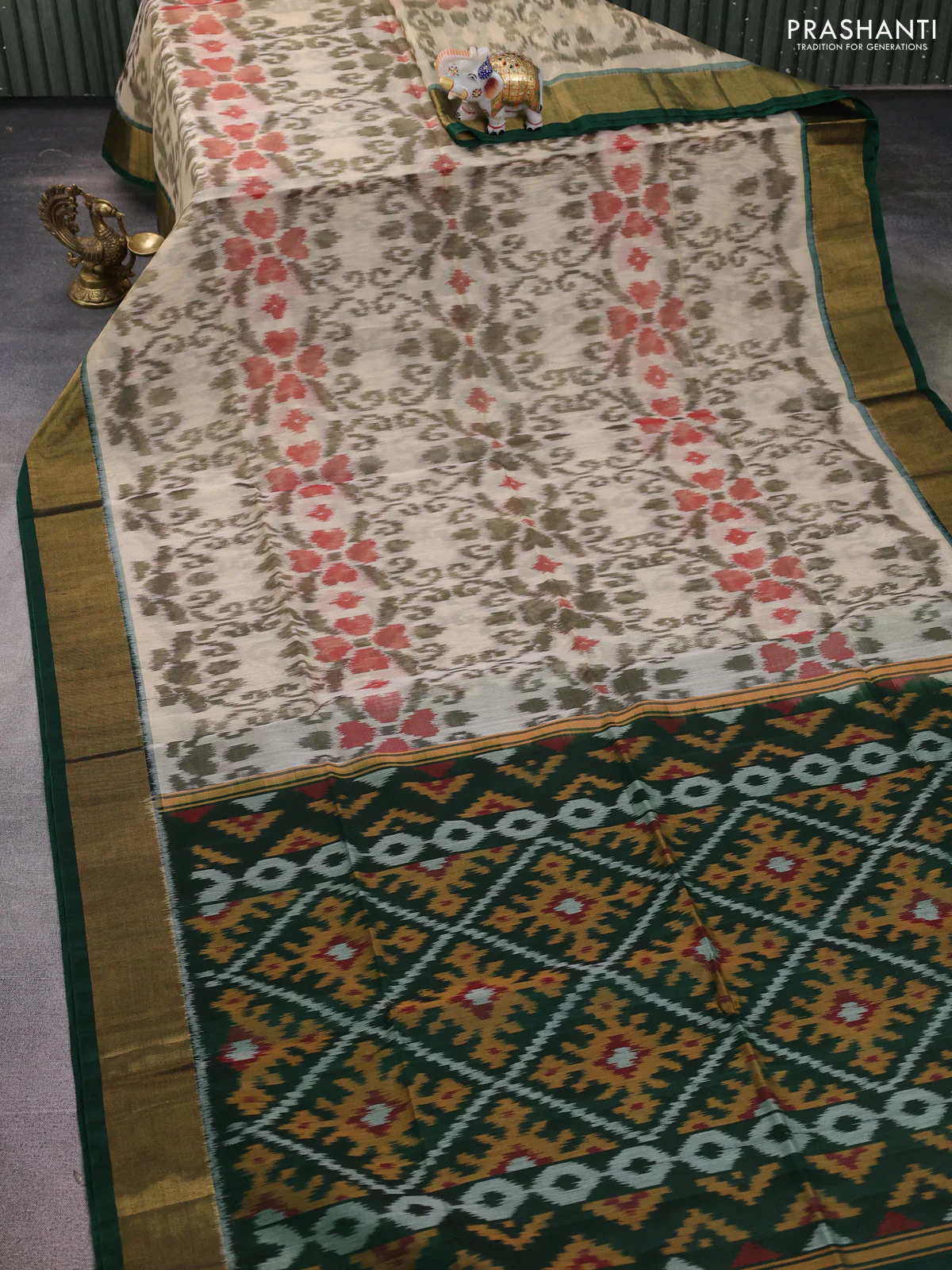 Ikat silk cotton saree beige and dark green with allover ikat weaves and zari woven border - Image 2