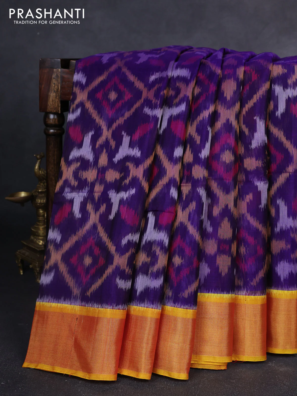 Ikat silk cotton saree blue and dual shade of mustard yellow with allover ikat weaves and zari woven border