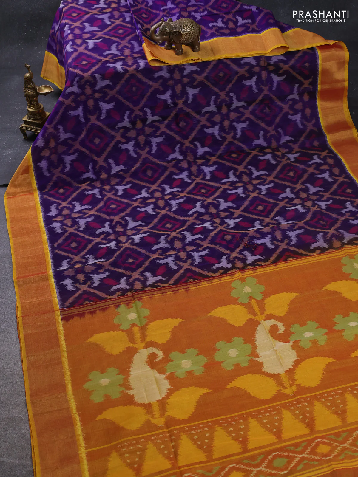 Ikat silk cotton saree blue and dual shade of mustard yellow with allover ikat weaves and zari woven border - Image 2