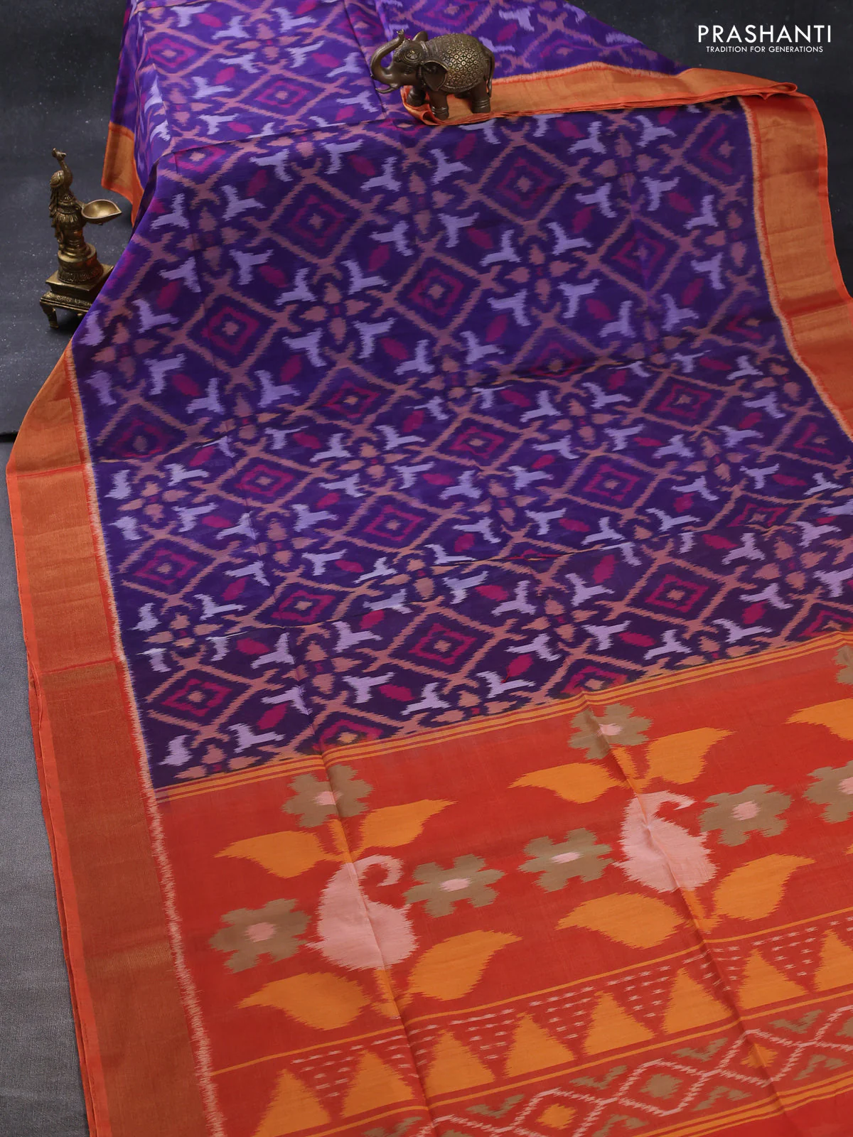 Ikat silk cotton saree blue and orange with allover ikat weaves and zari woven border - Image 2