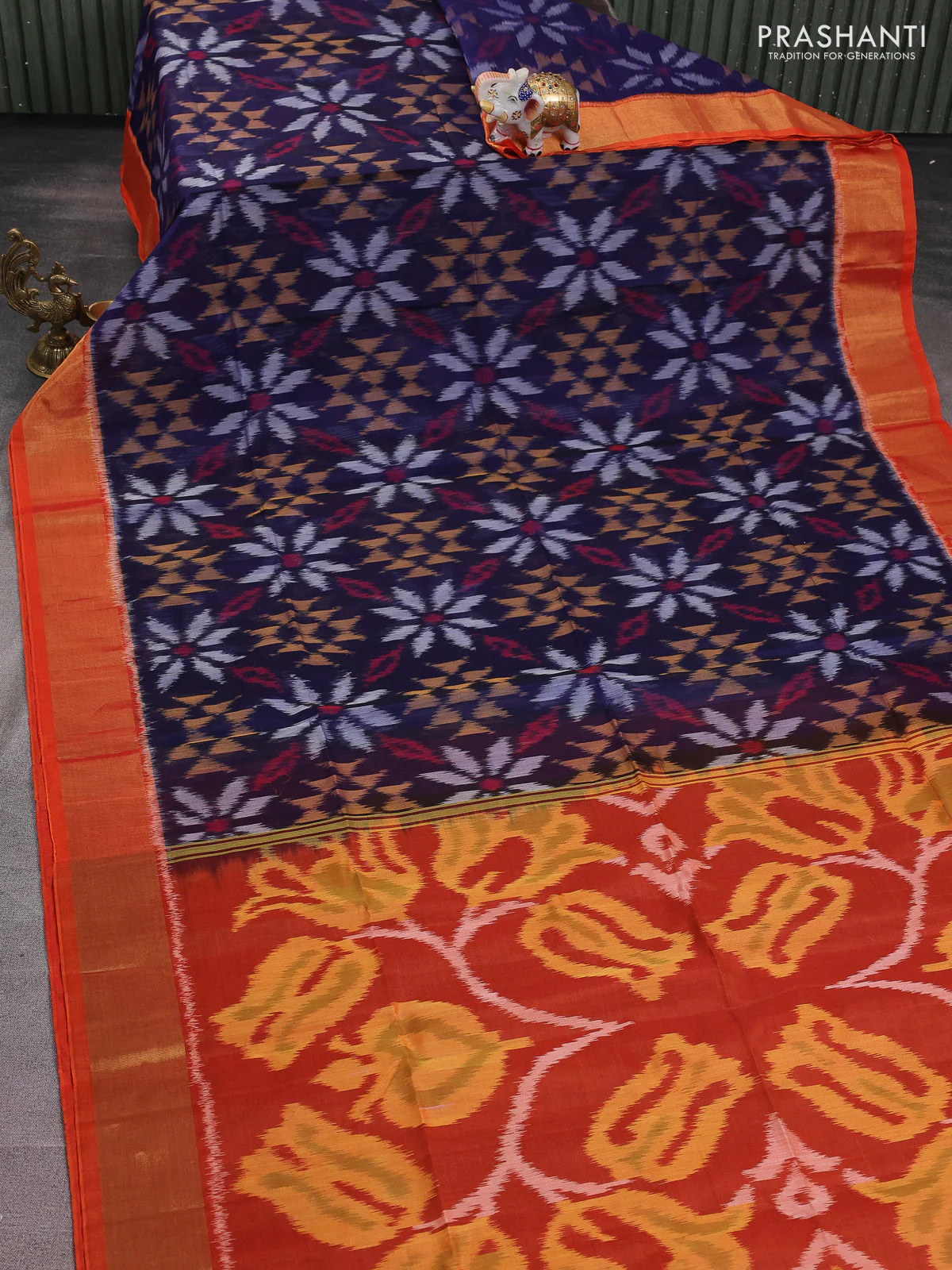 Ikat silk cotton saree blue and orange with alover ikat weaves and zari woven border - Image 2