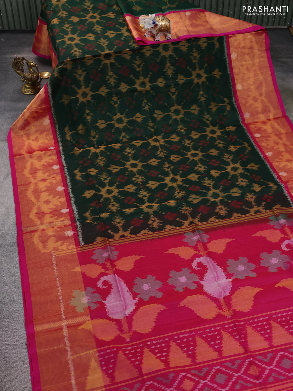 Ikat silk cotton saree bottle green and pink with allover ikat weaves and long zari woven ikat border - Image 2